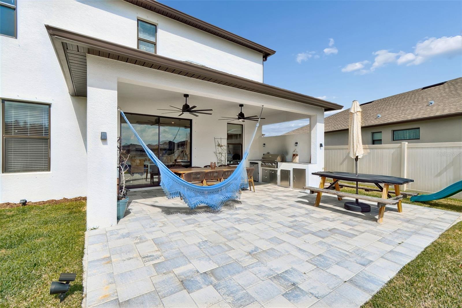 Extended pavers in backyard