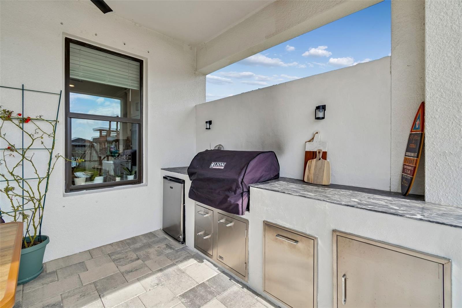 Outdoor grill and refrigerator