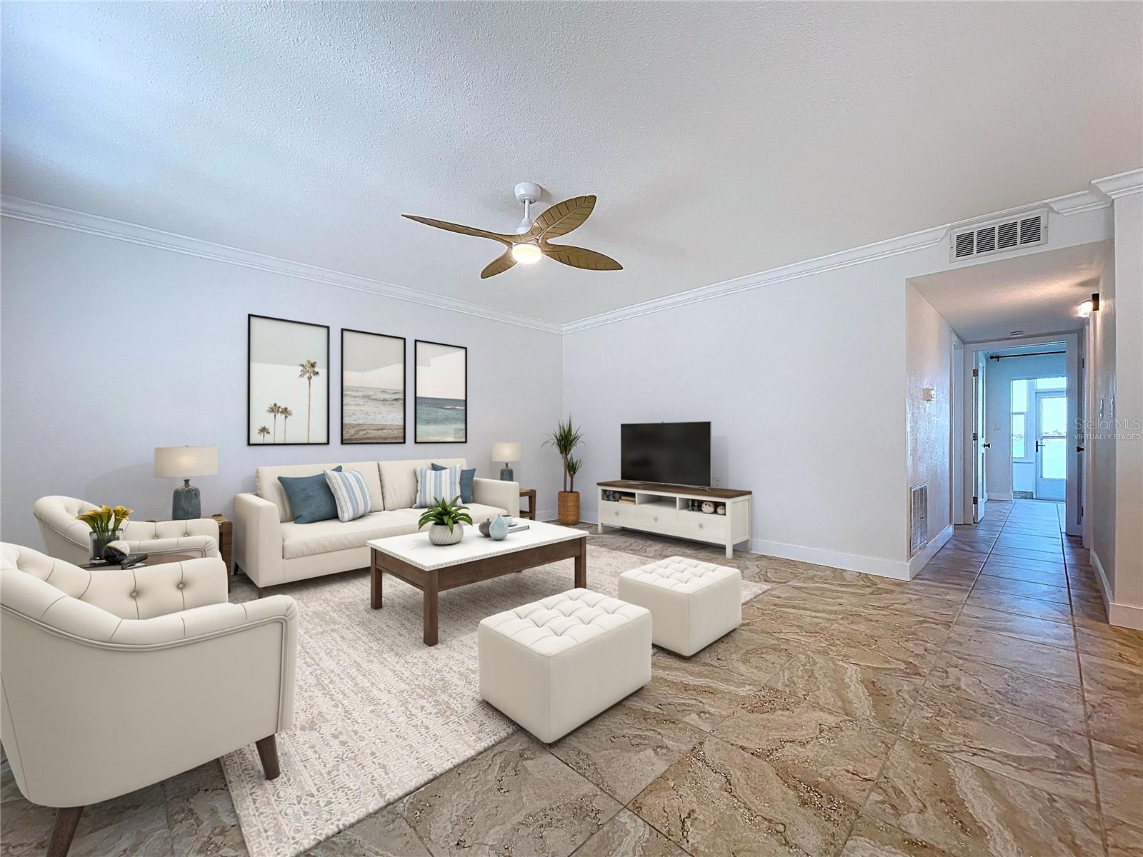 Virtually Staged living room with plenty of space to relax and enjoy the natural lighting in this corner unit.