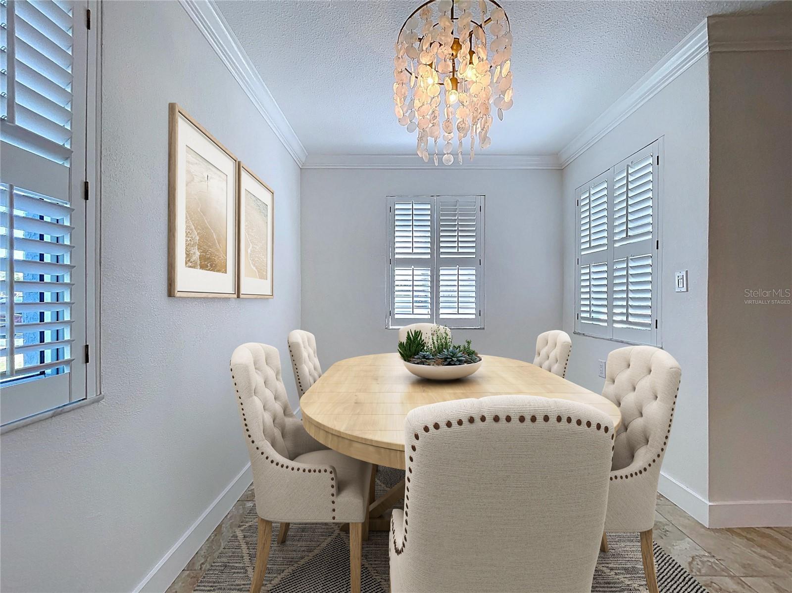 Virtually staged dining room filled with natural light from all sides.