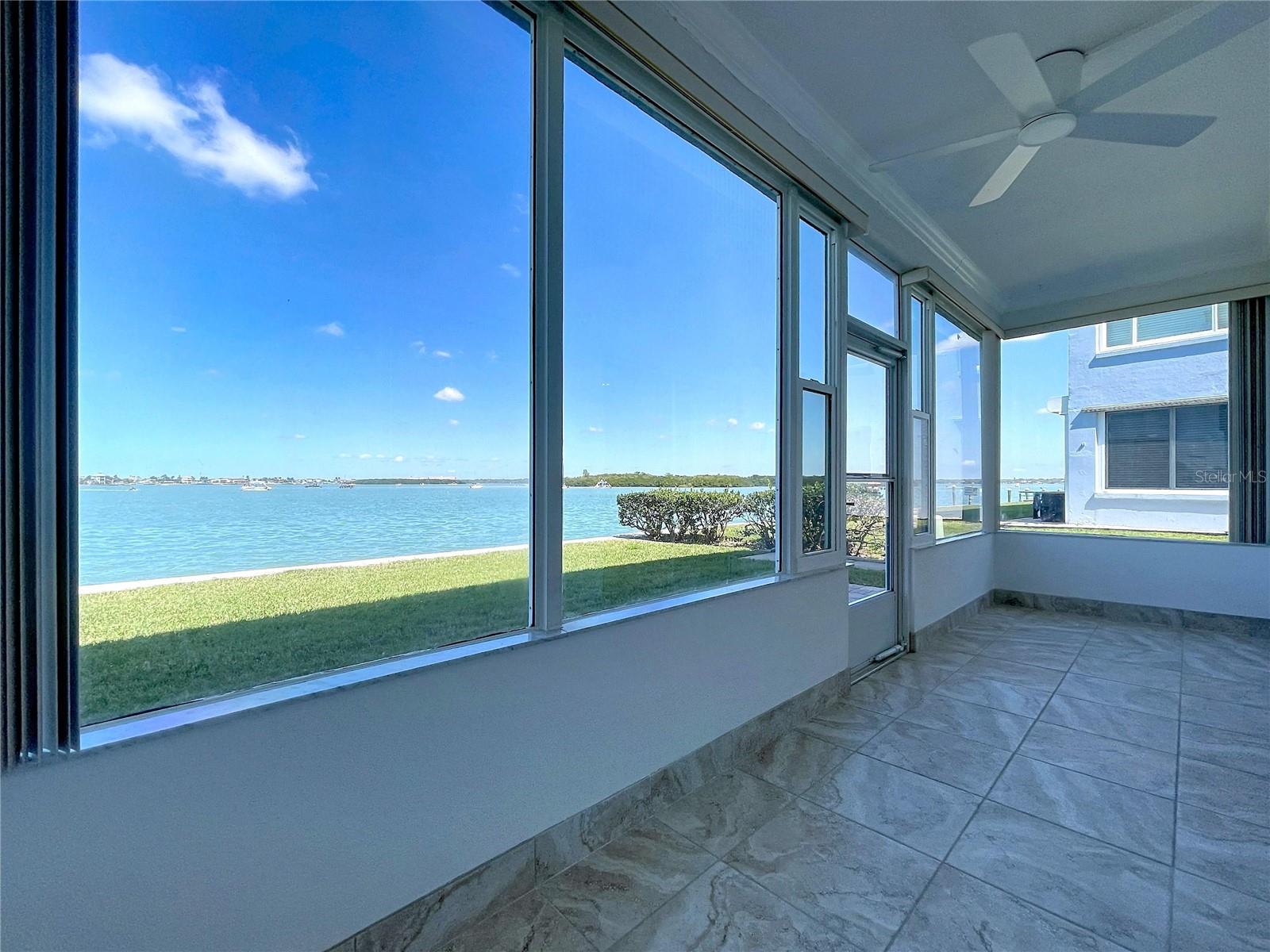 Sit and take in the views from your screened lanai.