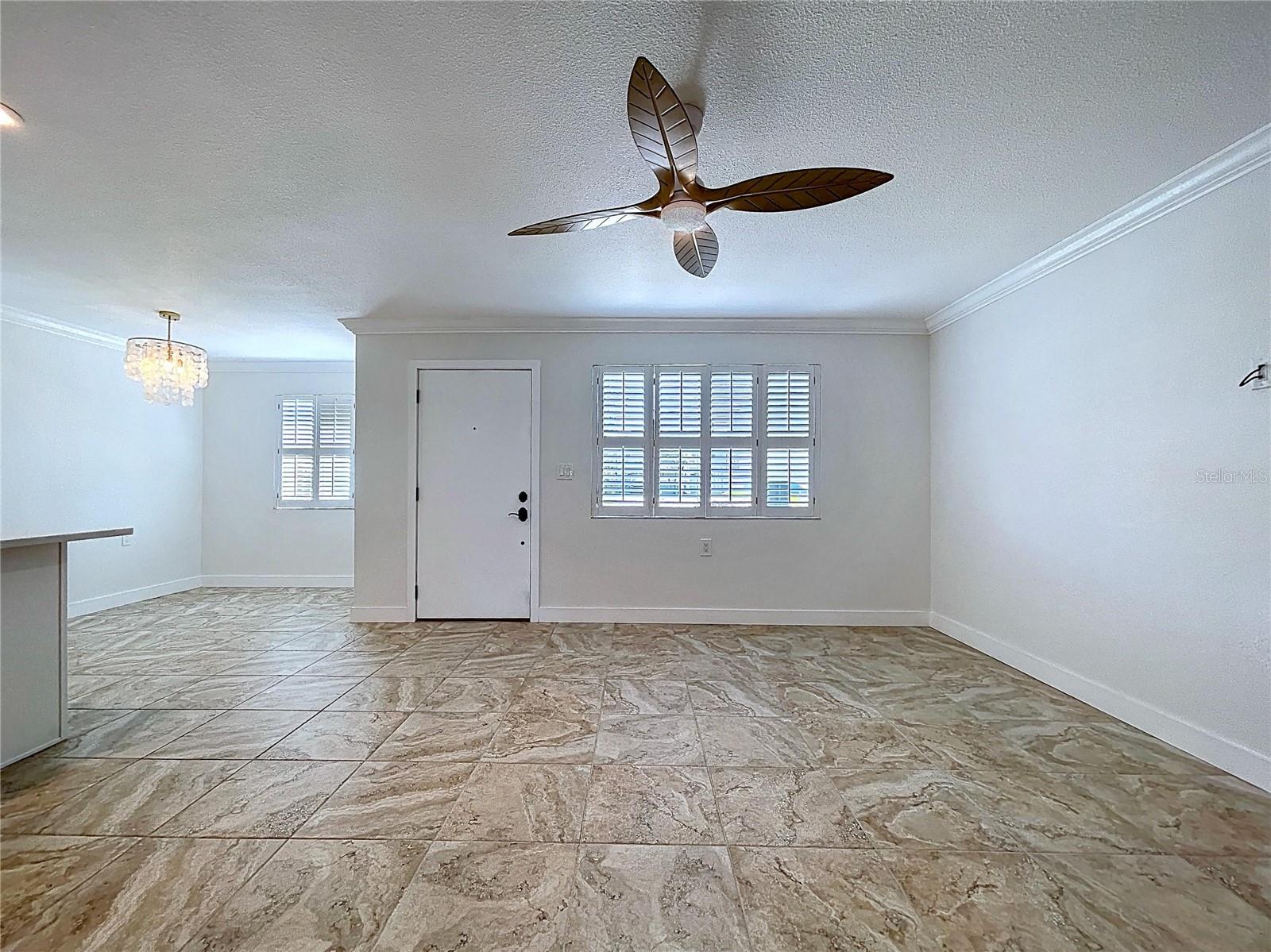 Large living room is inviting and full of natural light.