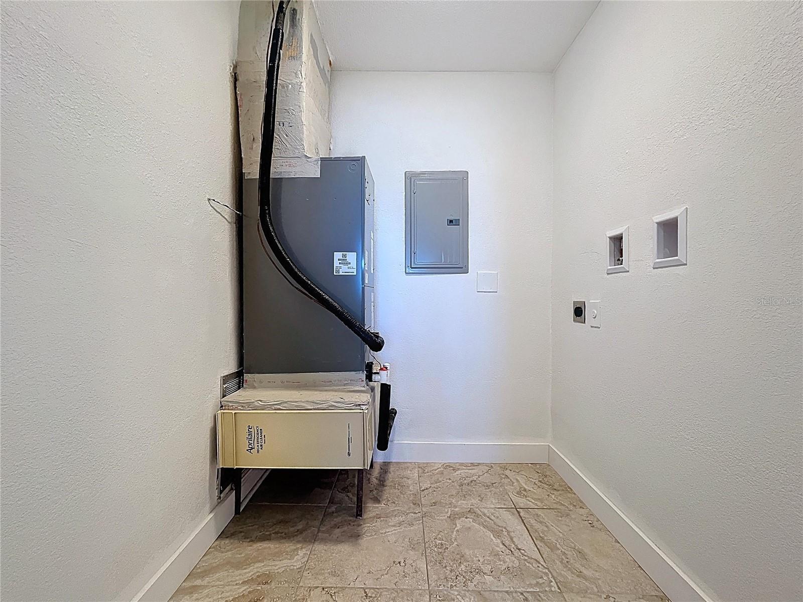 Large walk-in closet in the Primary bedroom offers washer and dryer hook ups.