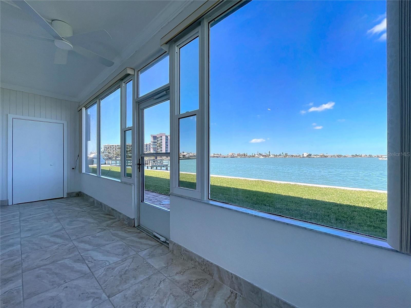 The enclosed lanai is a great space that adds room to the condo where you feel like you are taking the outside in with you.