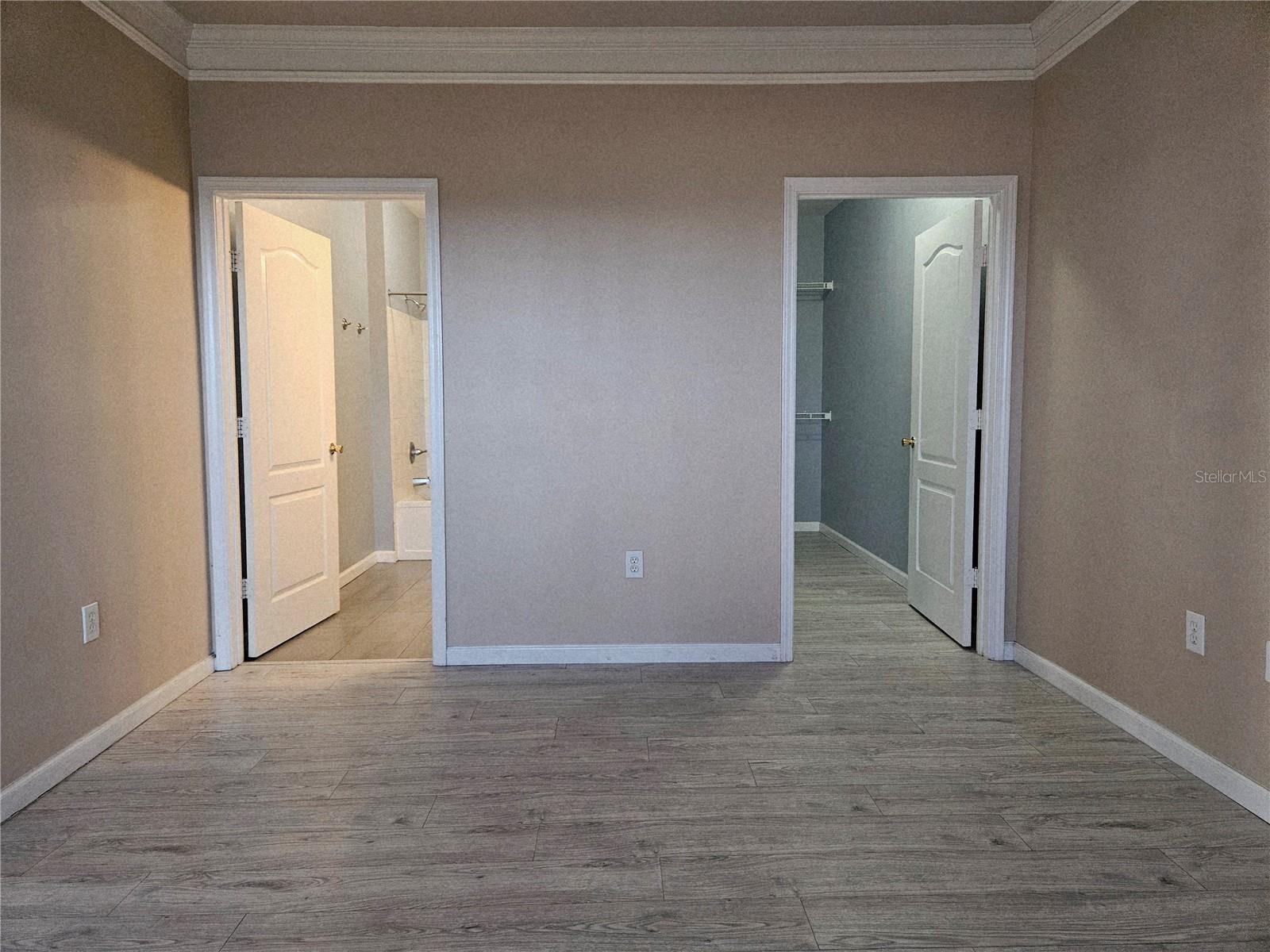 primary bedroom to closet and bath