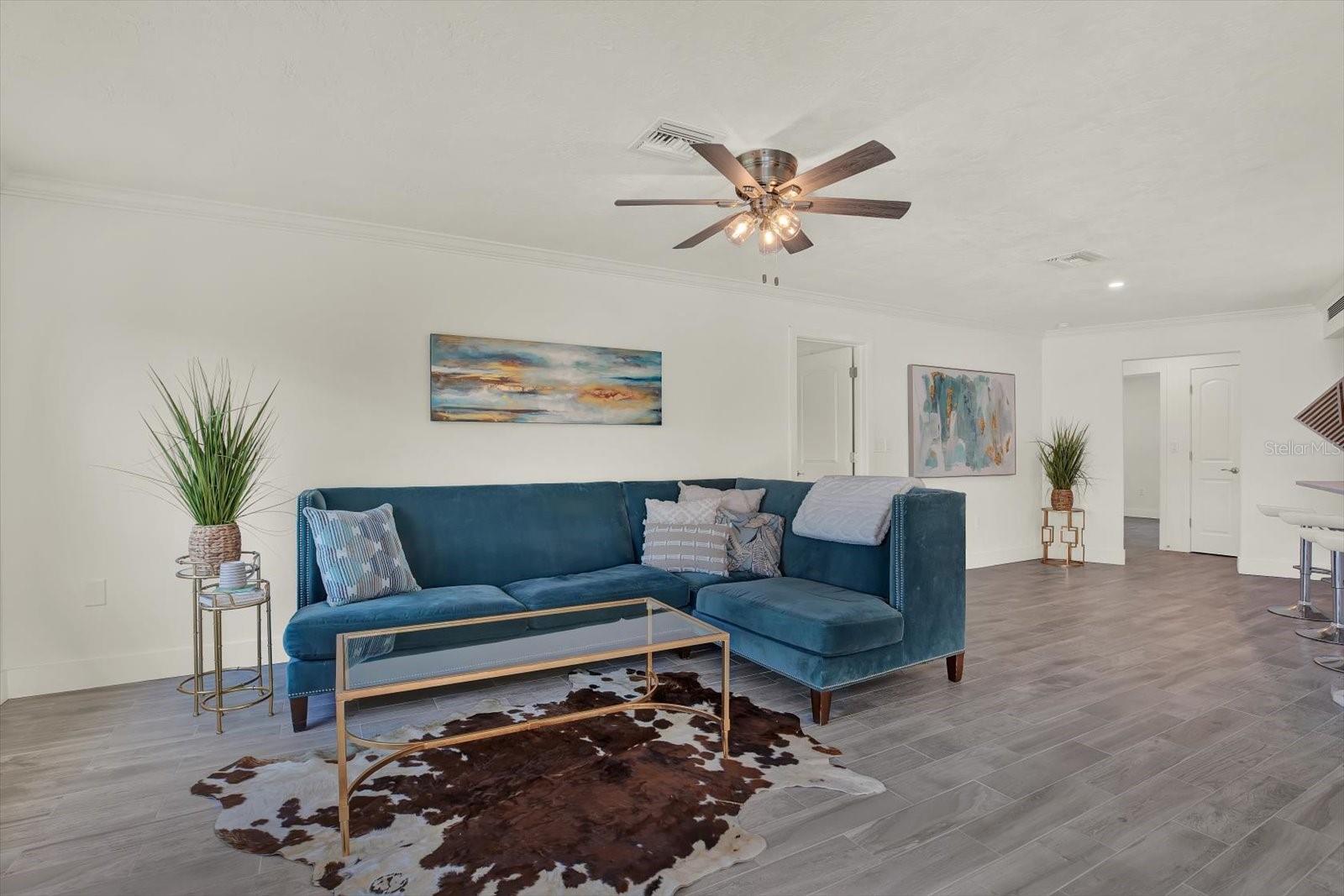 Oversized Family Room with water and pool view