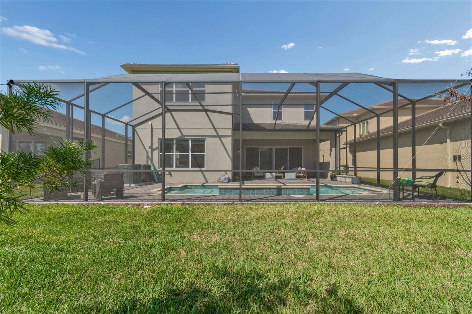 Generous screened pool area for entertaining!