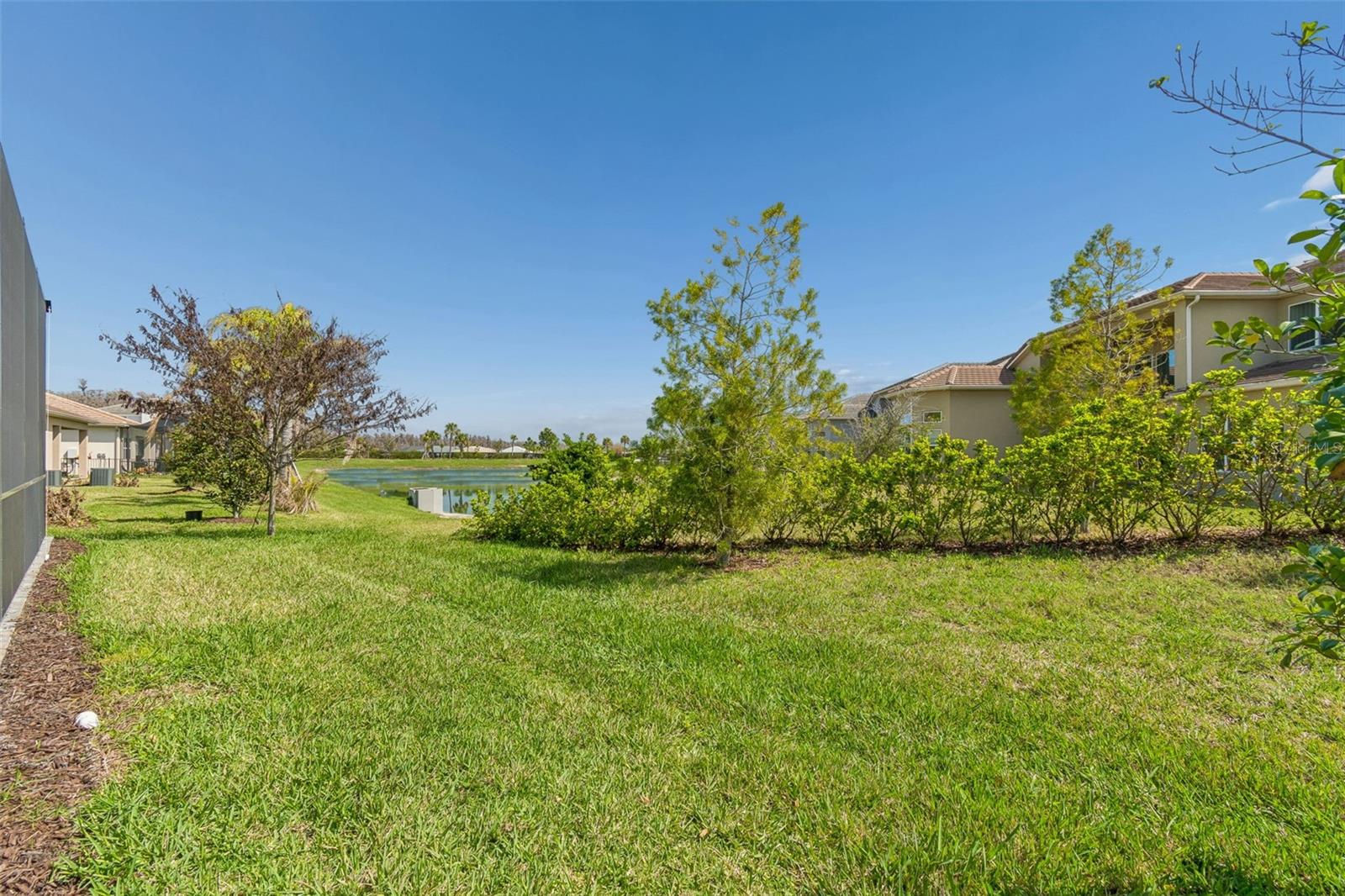 Corner view of pond from the screened lanai/pool area!