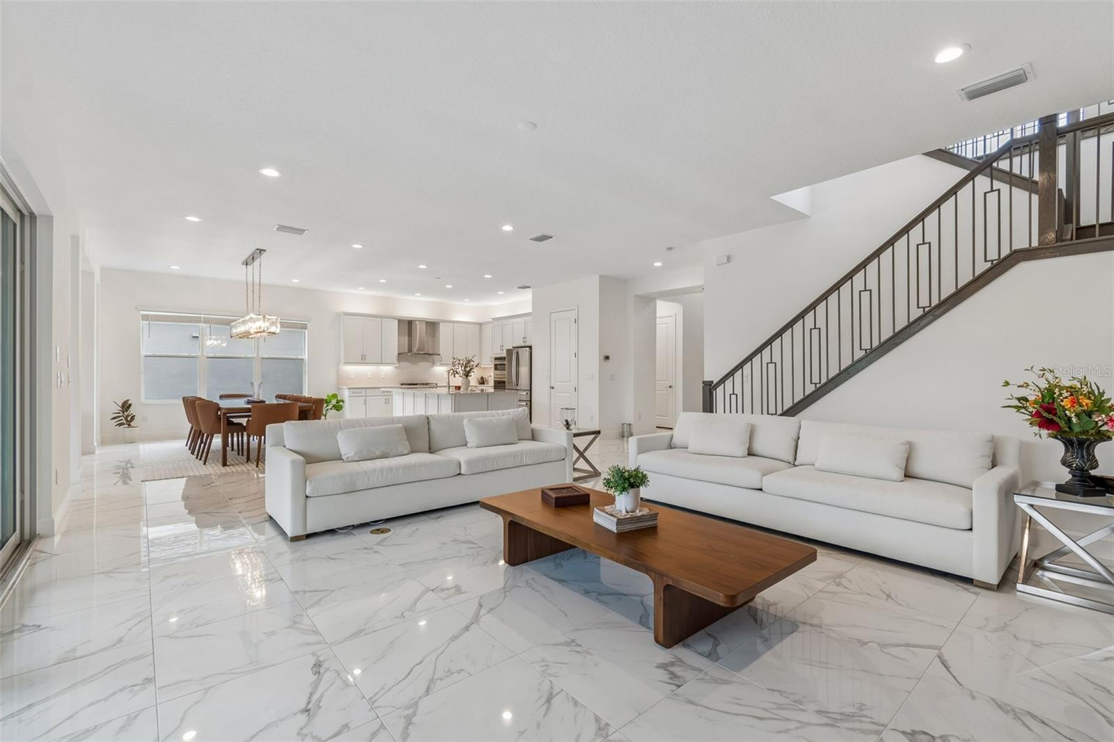 Gorgeous flooring and the contemporay staircase is beautiful!