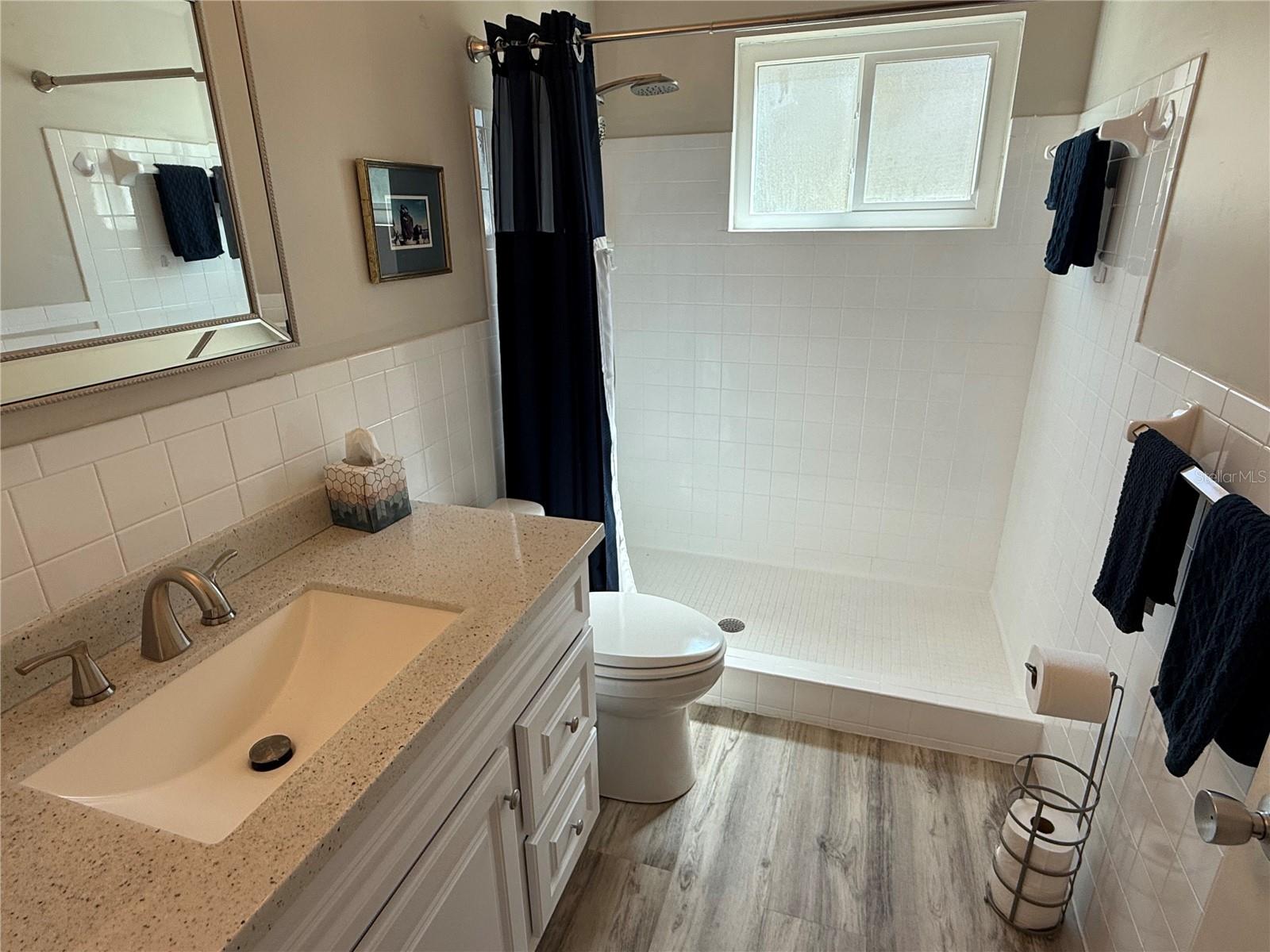 Updated primary bath with walk in shower