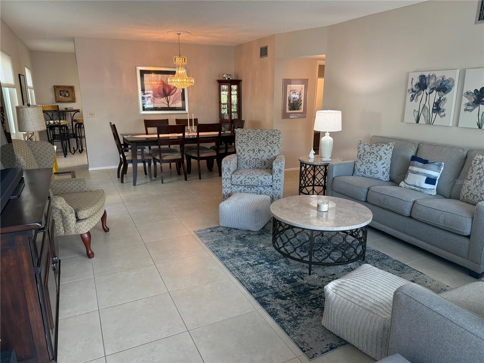 Living room with stylish furniture comes with the unit.