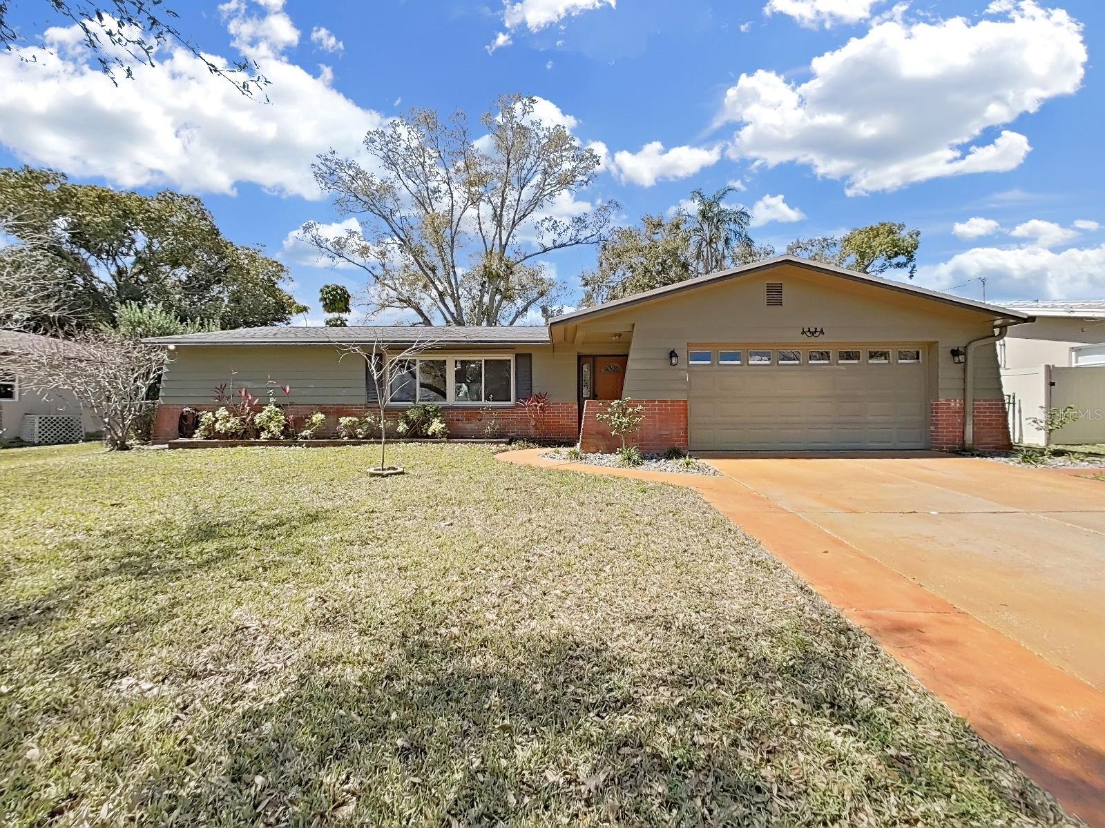 Spacious lot with manicured front and backyard.  Morningside Estates is an established Clearwater community with mature trees, landscape, and sidewalks.