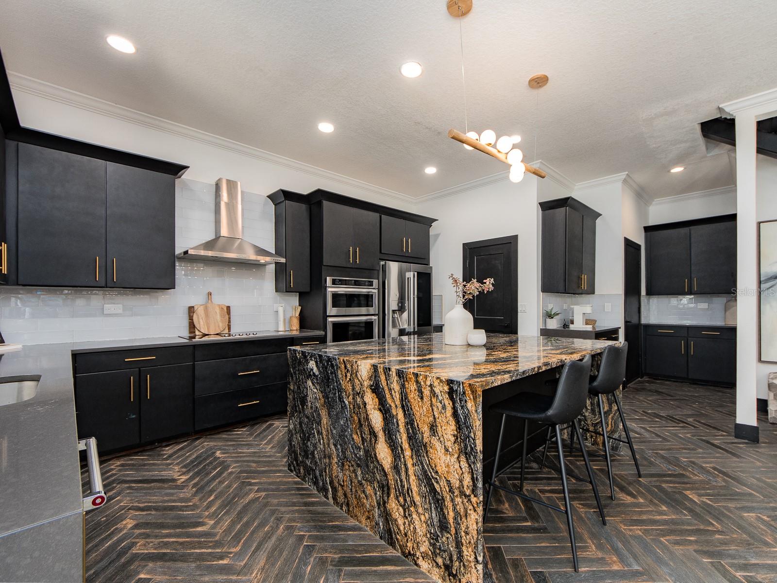 Chef’s Kitchen with Waterfall Island