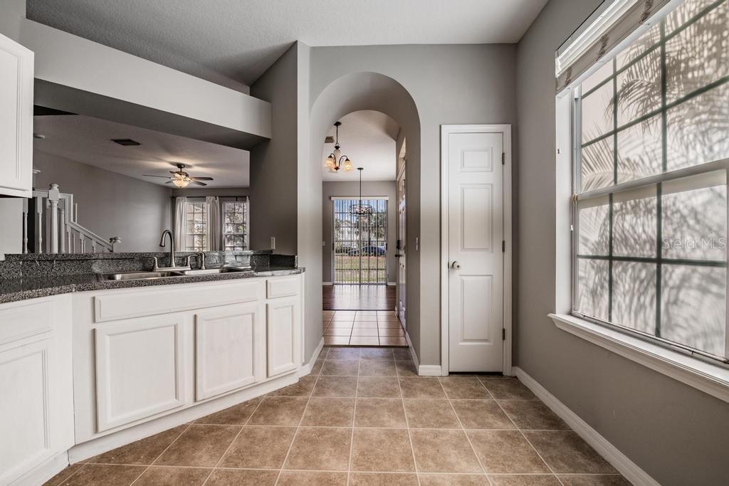 Kitchen, granite counter tops, tile flooring, lots of light.