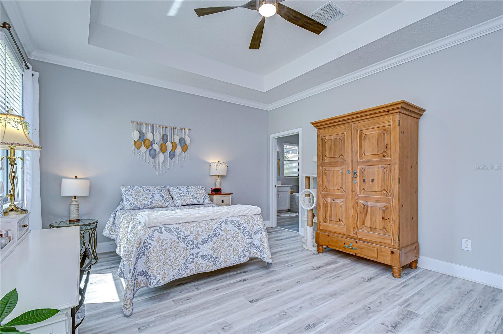 Elegant tray ceiling and relaxing retreat atmosphere.
