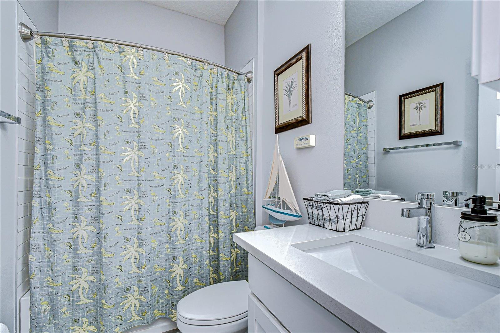Secondary full bathroom providing convenience for guests and family.