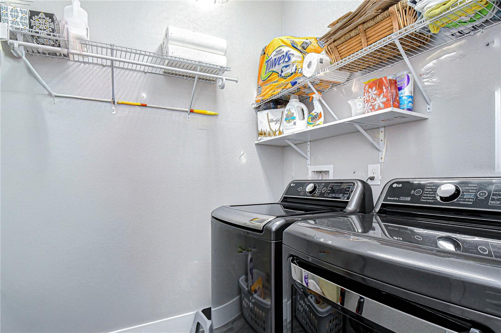 Convenient laundry room connected to the owner’s suite.
