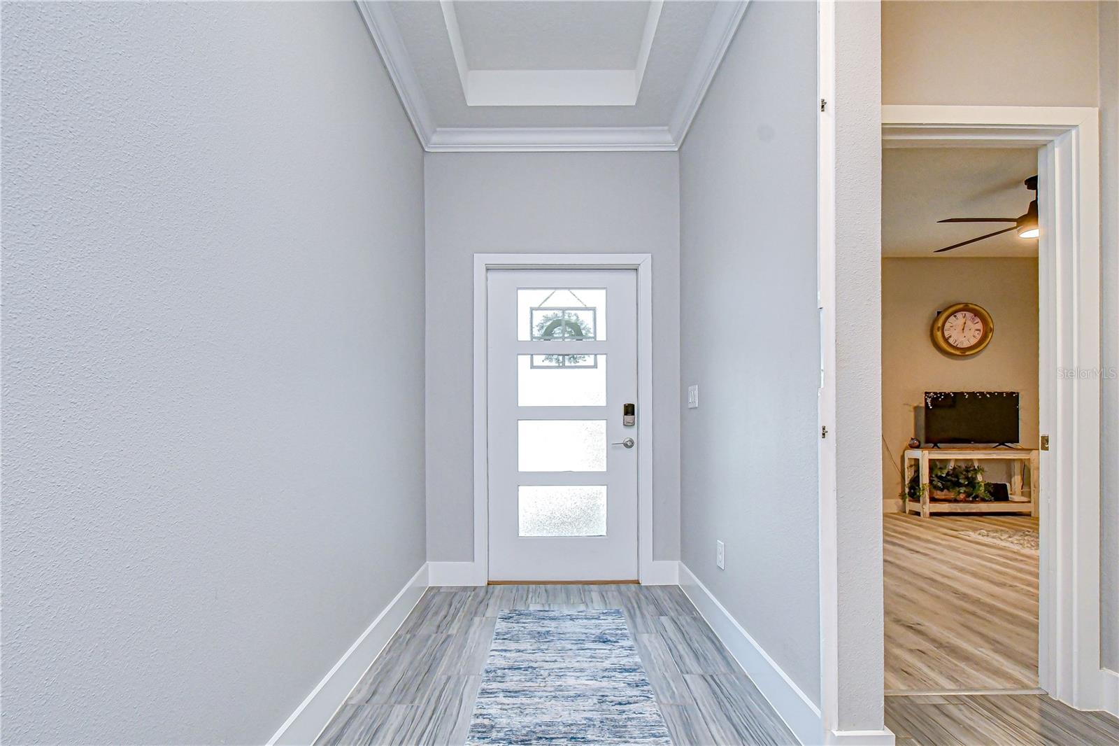 Welcoming foyer guiding you into the heart of the home.