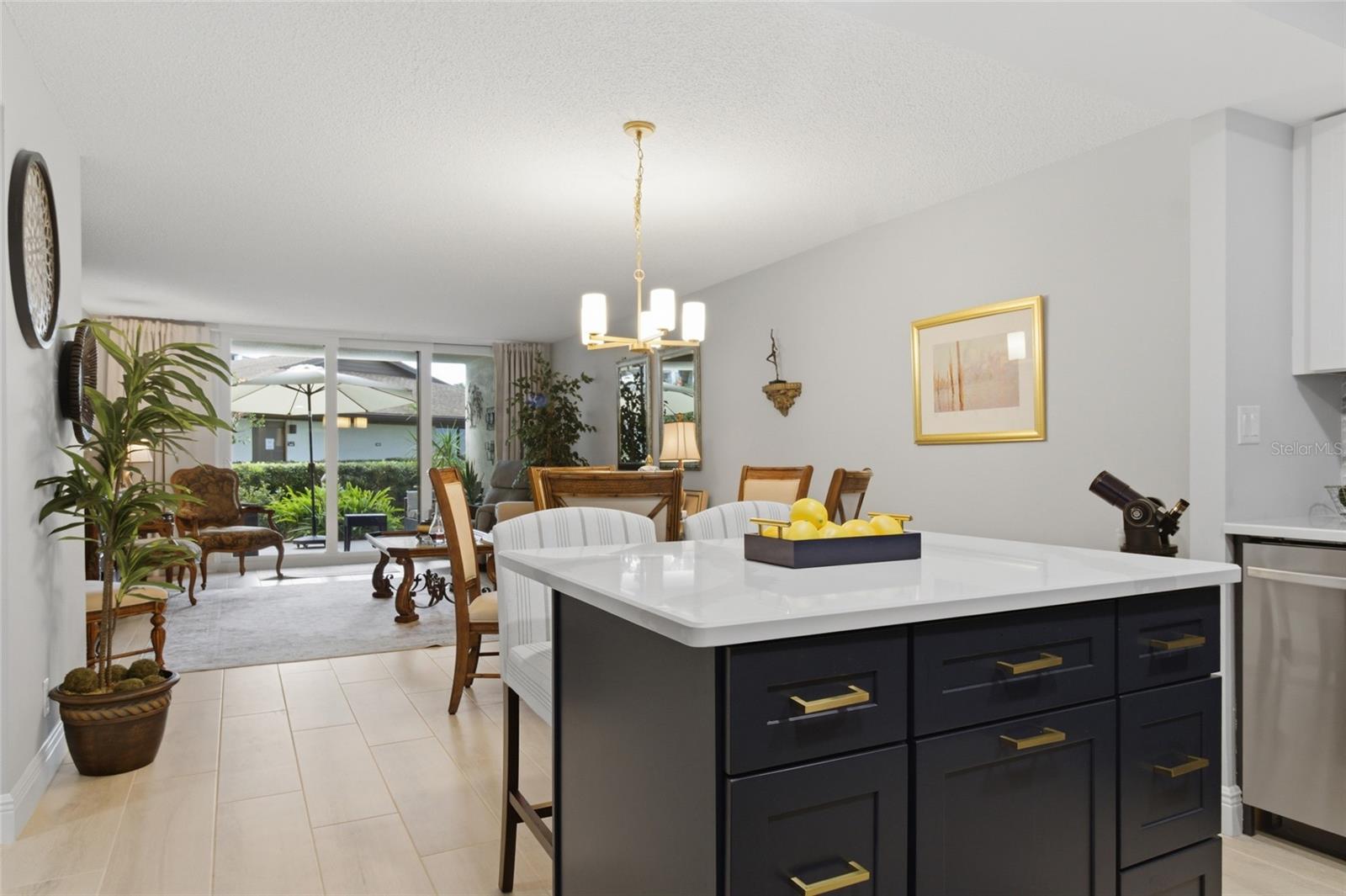 Kitchen Island Seating into Dining Room and Living Room