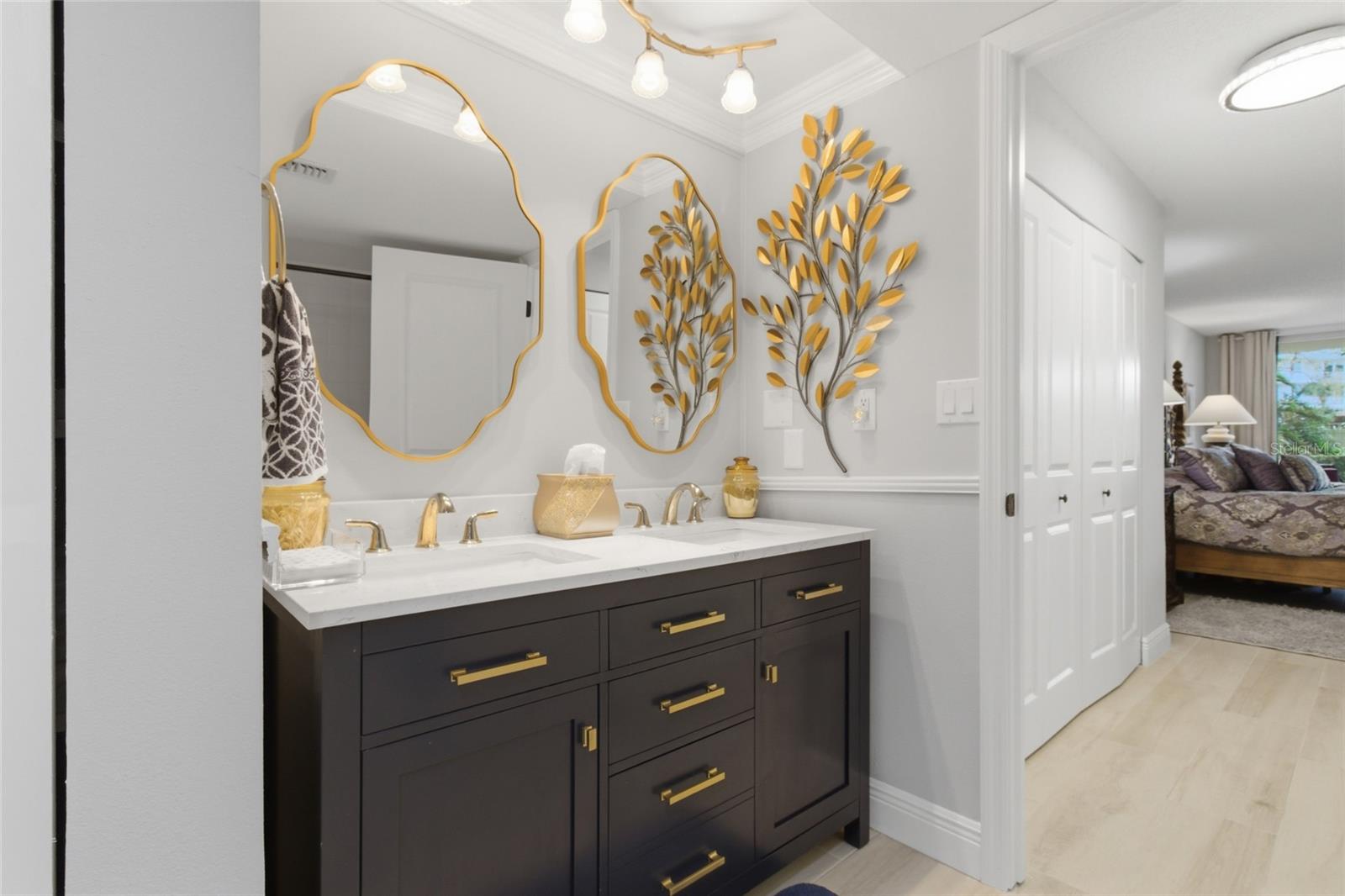 Primary Ensuite Bath/shower combo, Wainscotting, linen closet and dual vanity