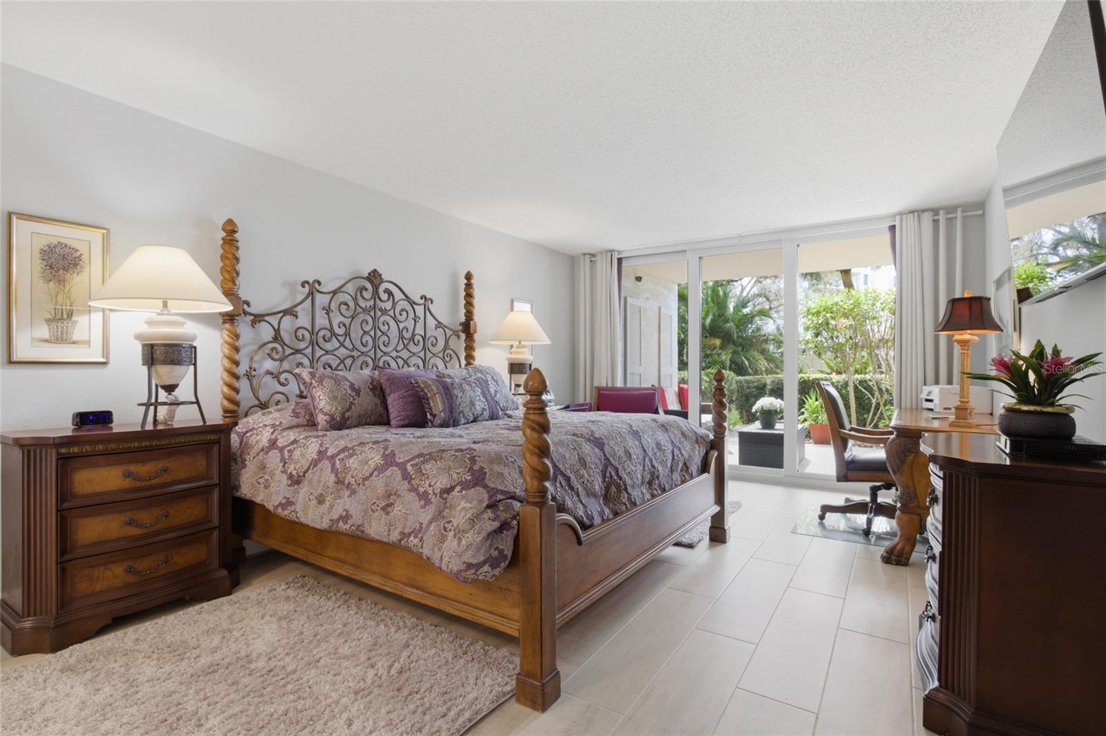 Primary Bedroom with Sliders to Patio/Lanai......with Water Views!