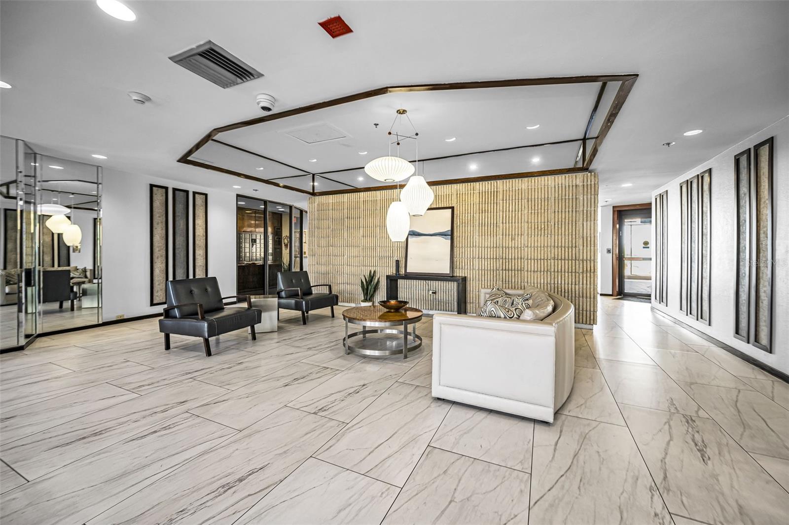 Sleek, modern Lobby at 1660 Gulf Blvd / Dan's Island Condos South building