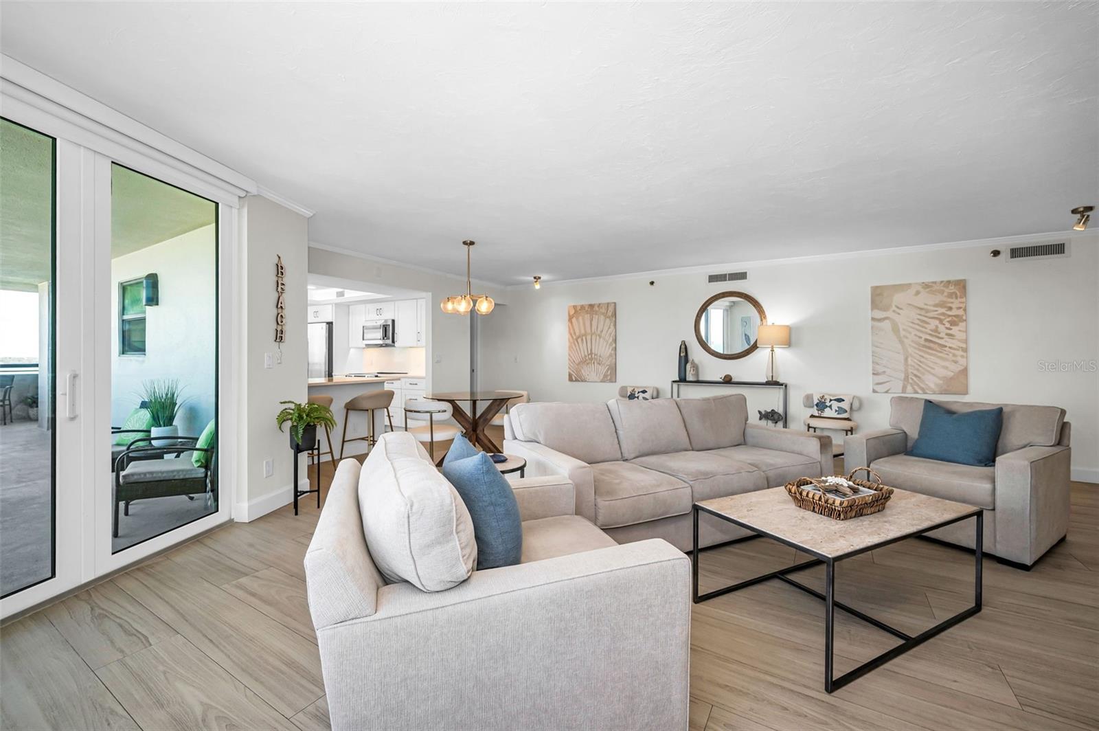 Living area looking into the Dining area & Kitchen