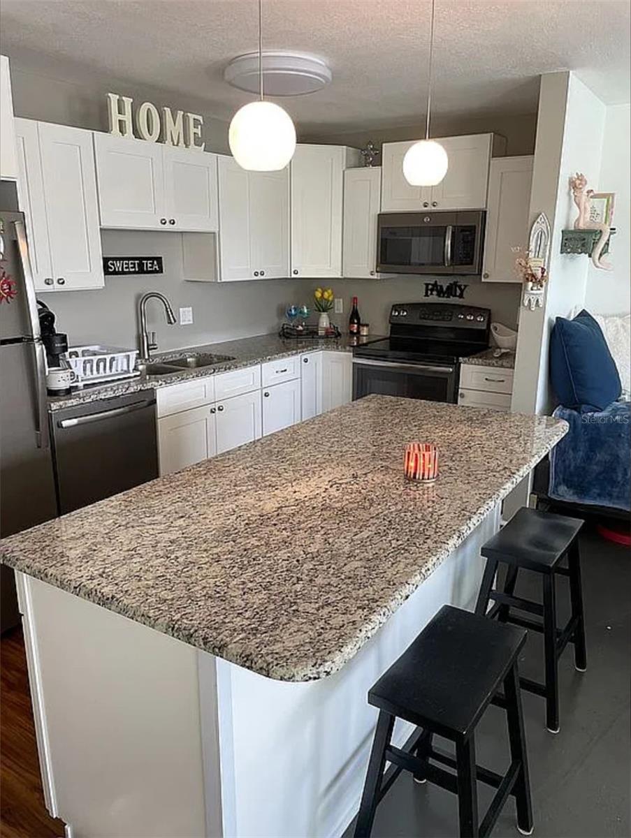 Kitchen with large island for food prep and entertaining