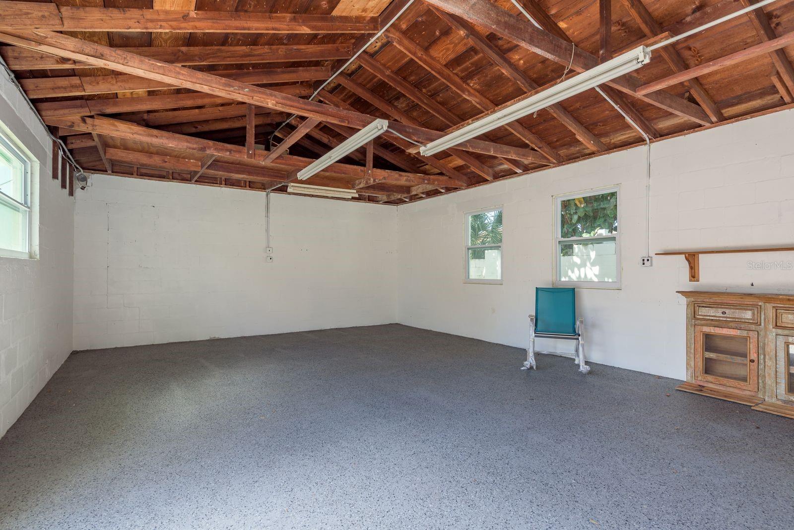 Left side of the large garage/storage area