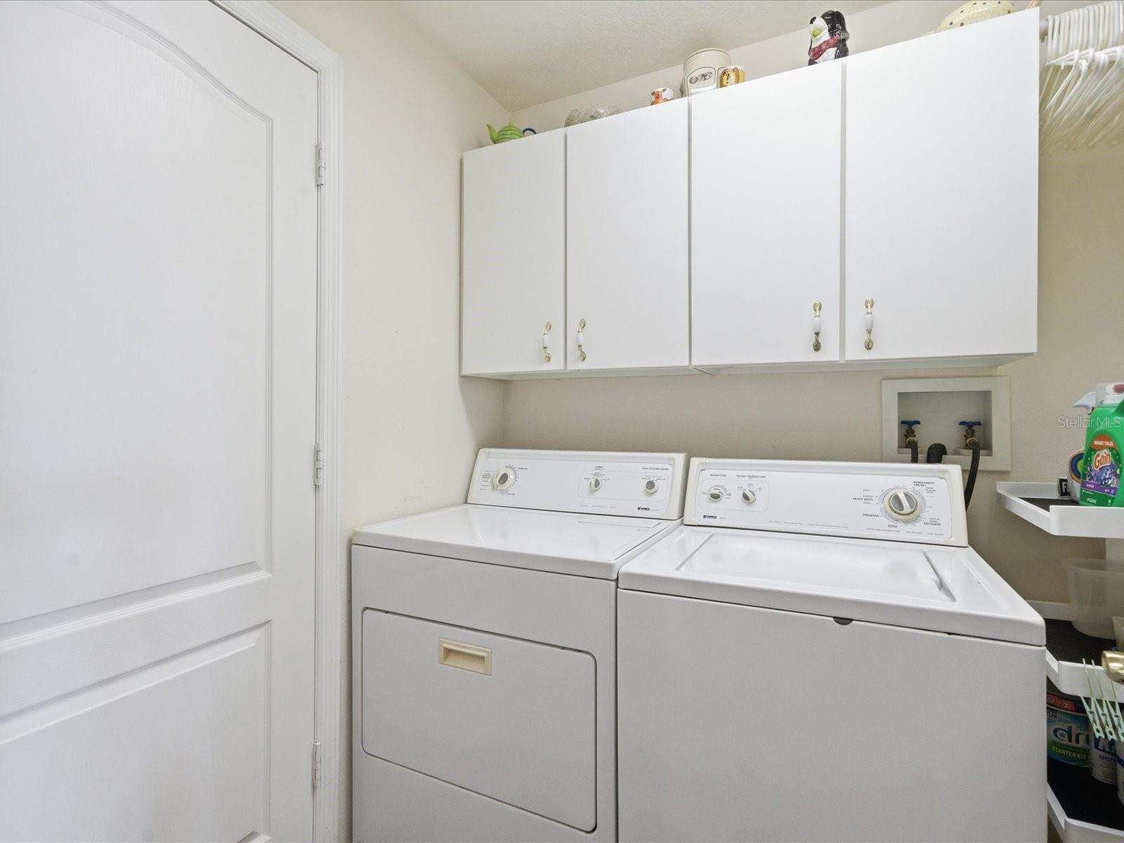 Laundry room with utility sink.