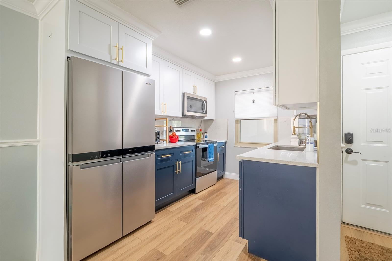 Quartz Counter tops wooden cabinets