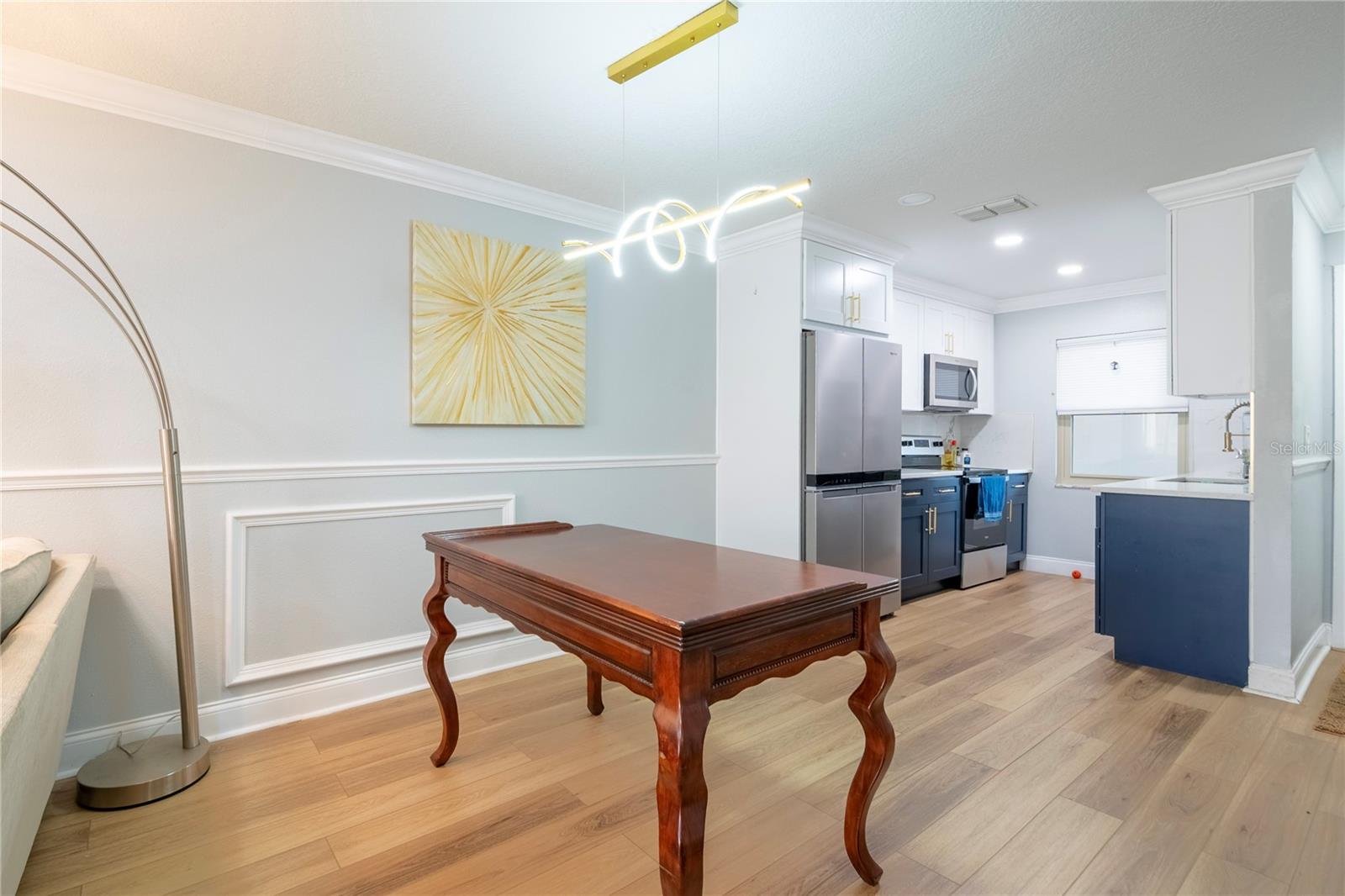 Dining room area looking into the kitchen