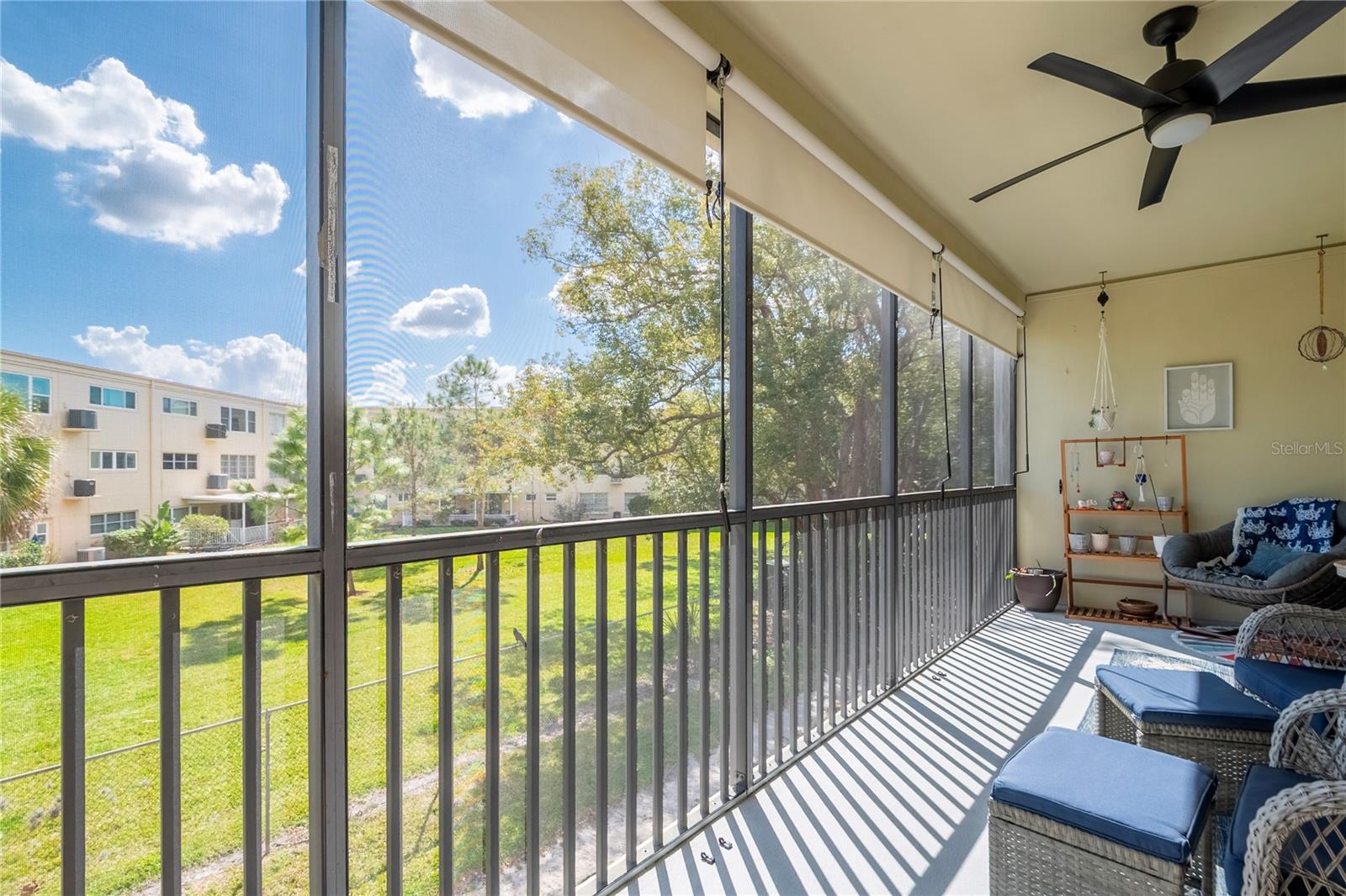 8' x 23' screened in Florida room with sunshades