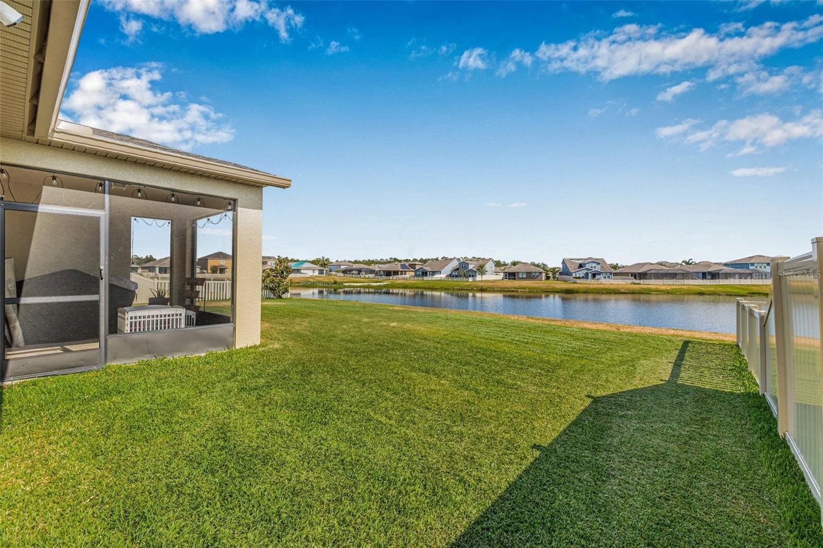 Private Screened Patio, Spacious Yard and Pond Views