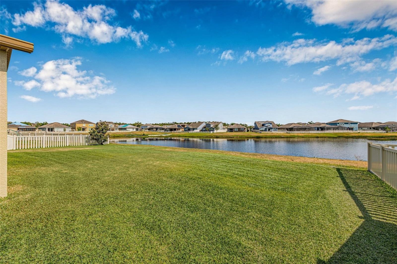 Spacious Yard with Pond Views