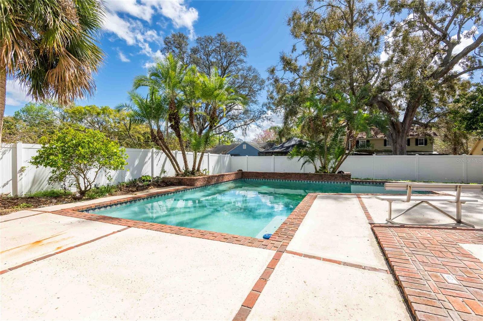 YARD IS COMPLETELY FENCED IN WITH VINYL FENCING.