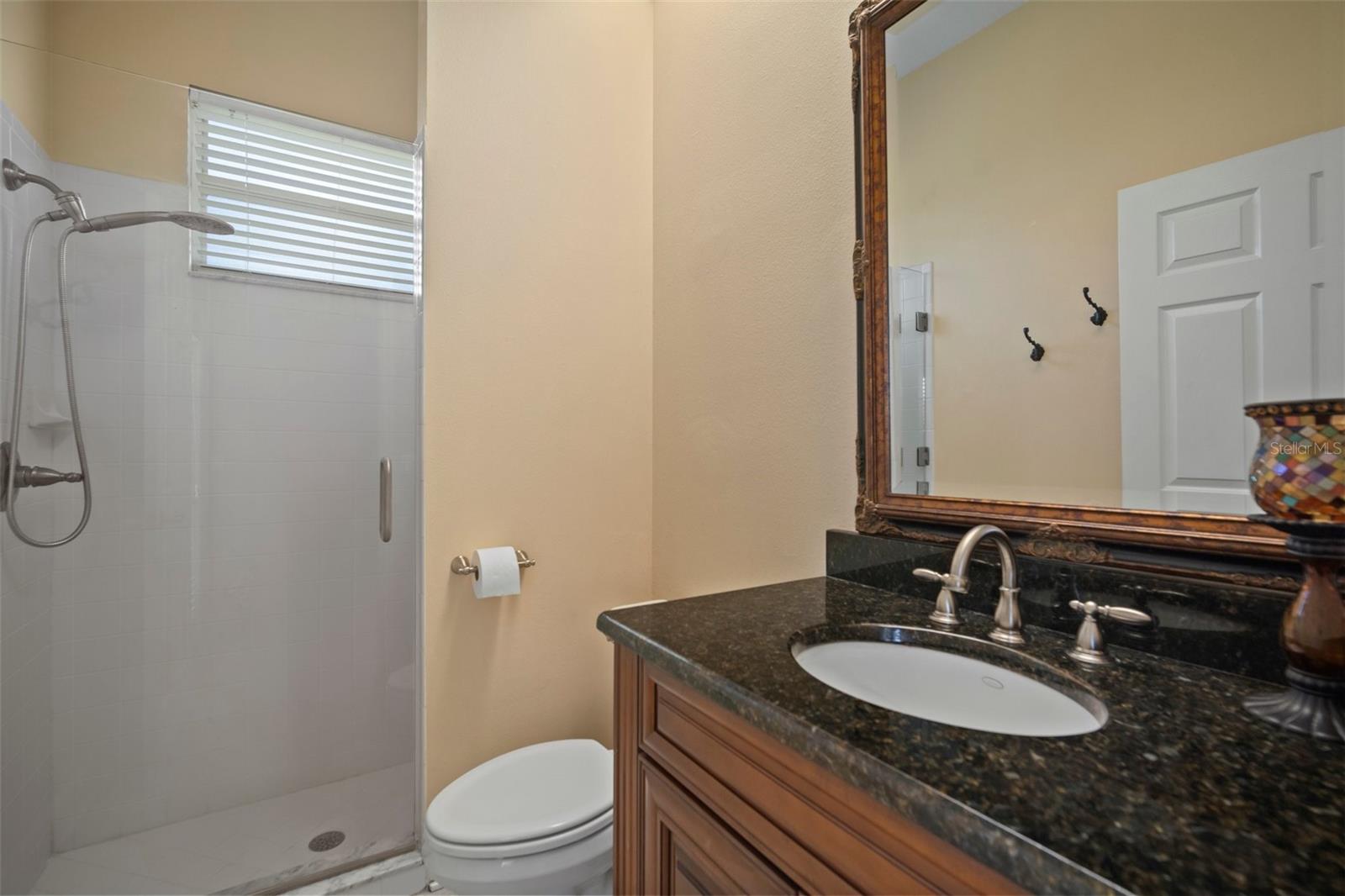 Guest bath with door leading outside