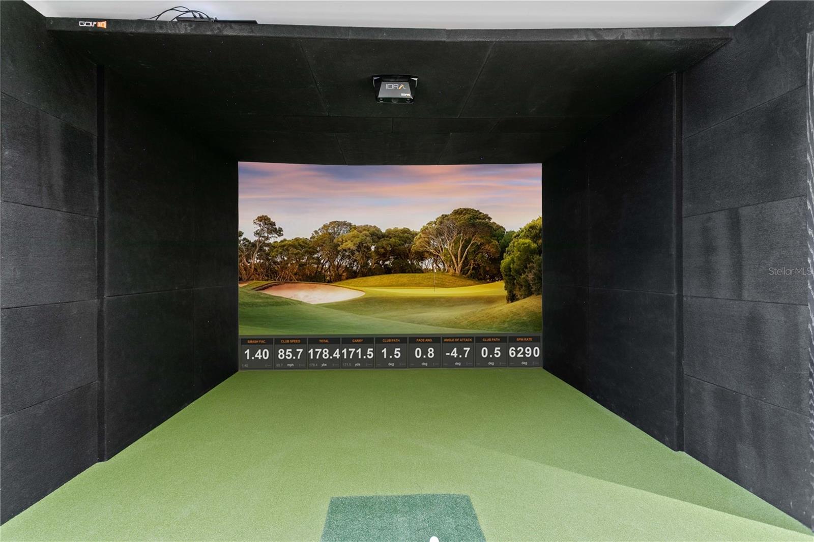 Media lounge with golf simulator
