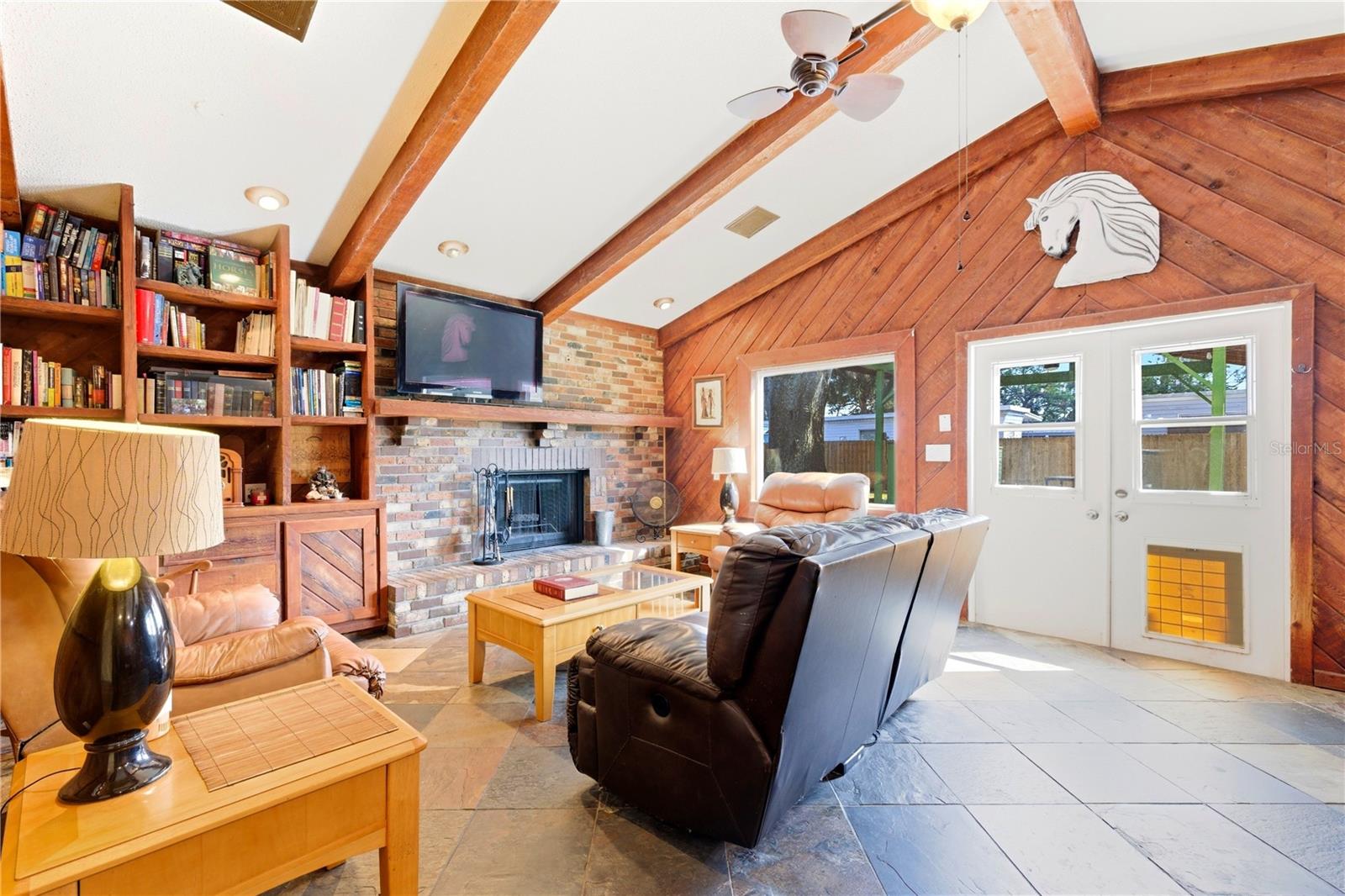 This amazing family room has gorgeous vaulted ceilings