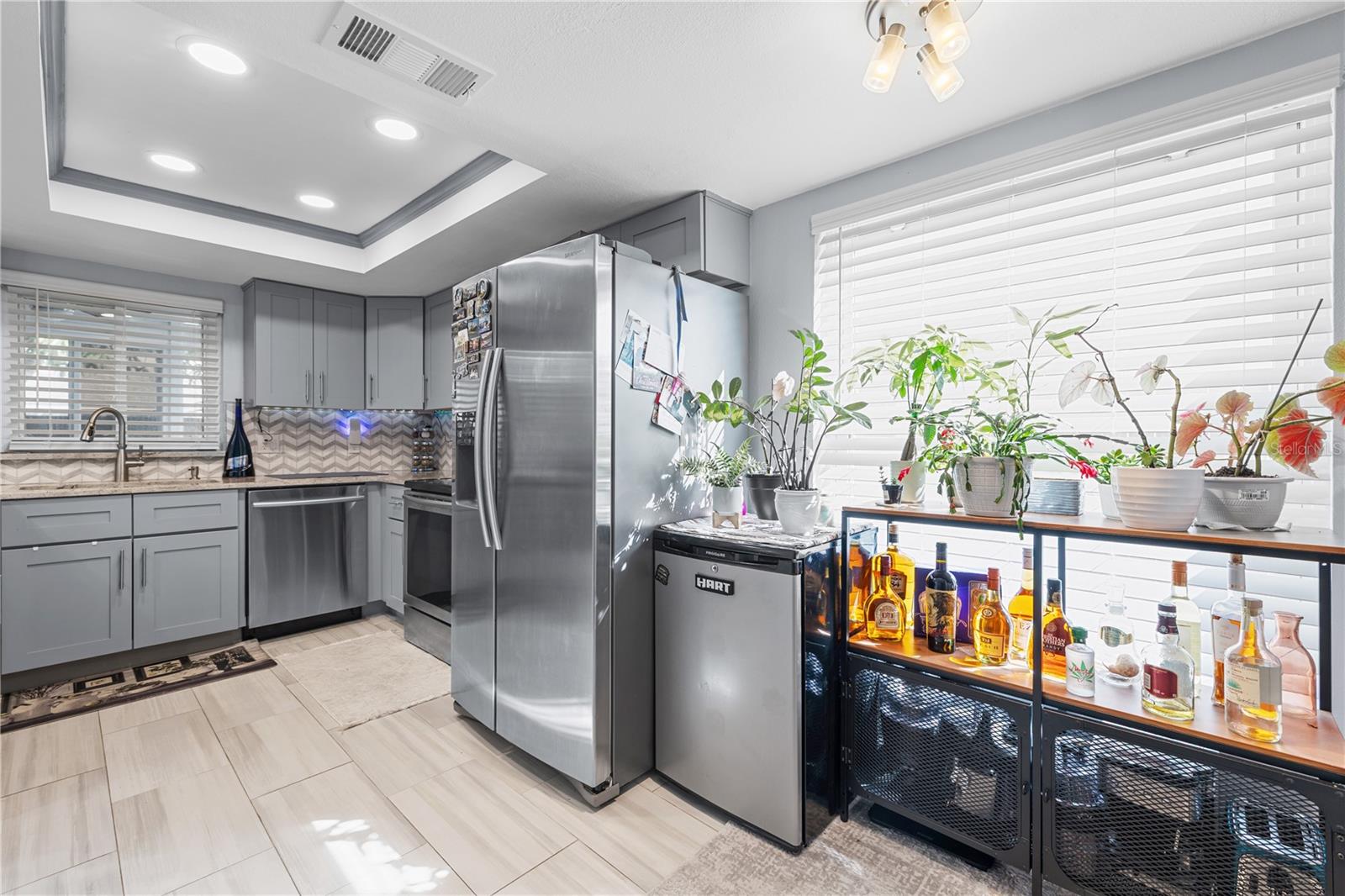 The spacious kitchen offer plenty of options for this use of space