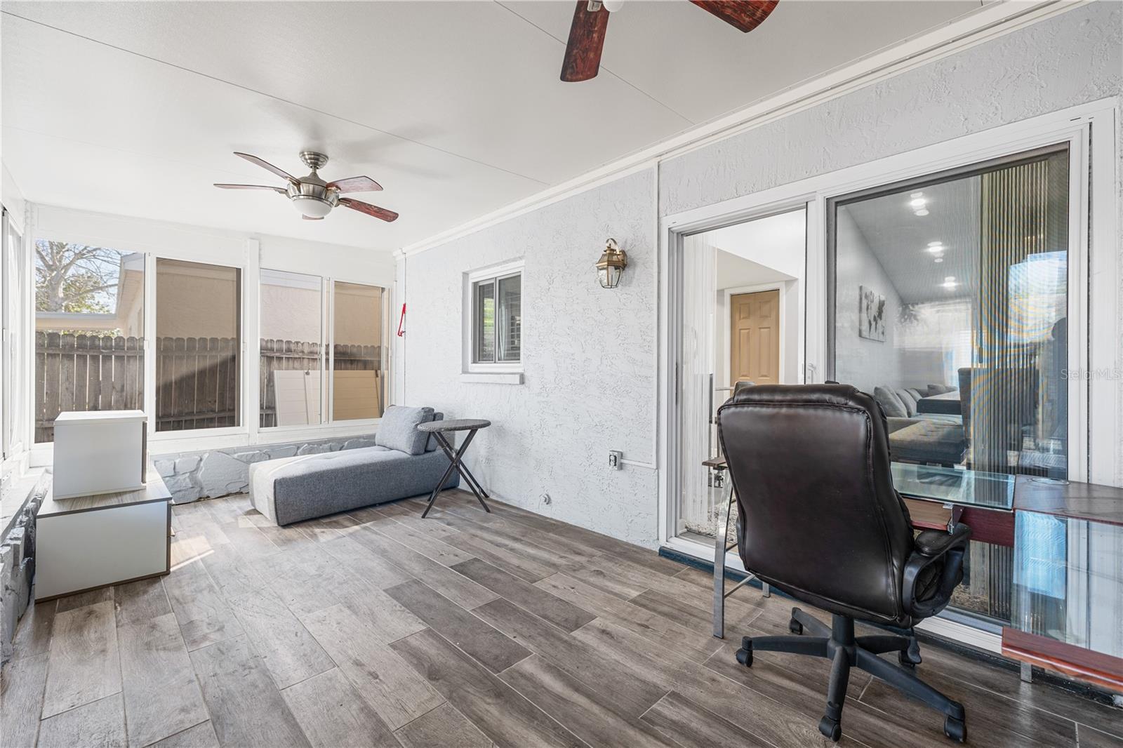 The enclosed Florida room provides an additional 200 square feet not included in the official square footage