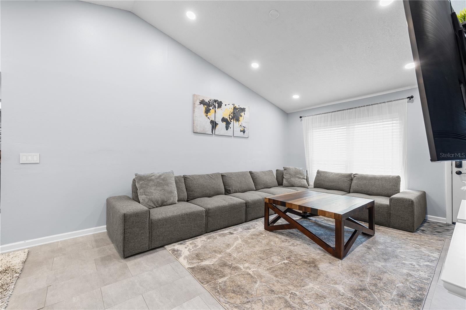The large living room is perfect for entertaining or relaxing after a long day.