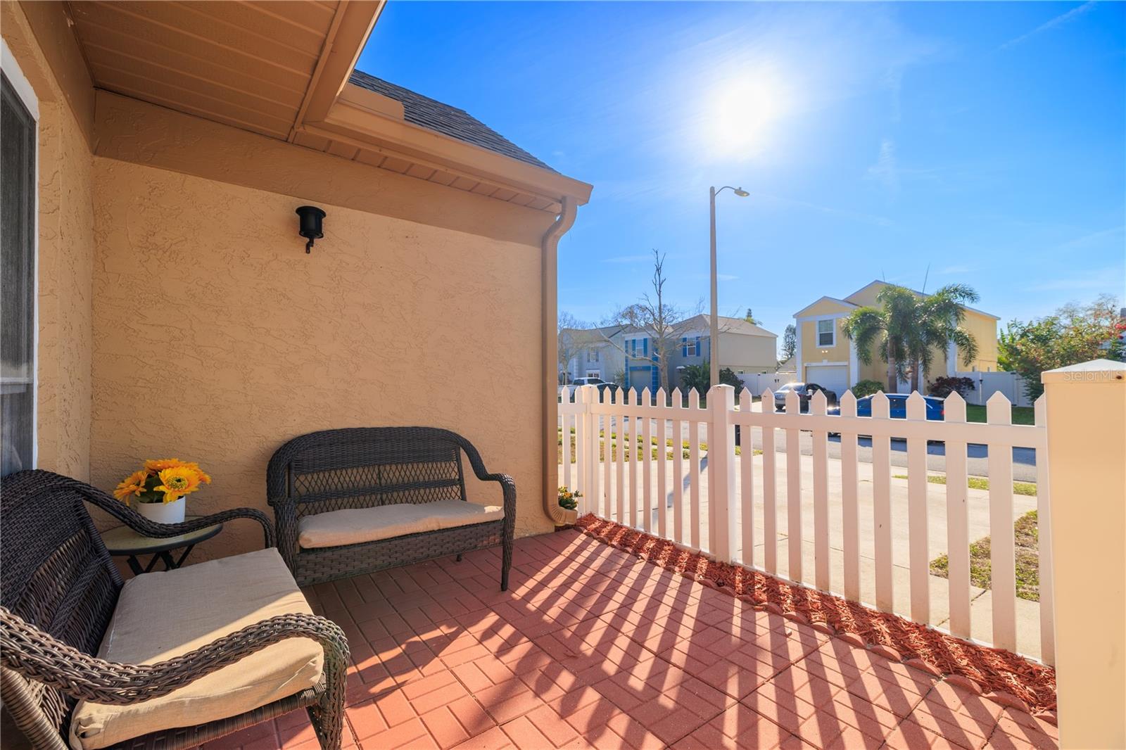 Enjoy the sunshine and fresh air on the front patio