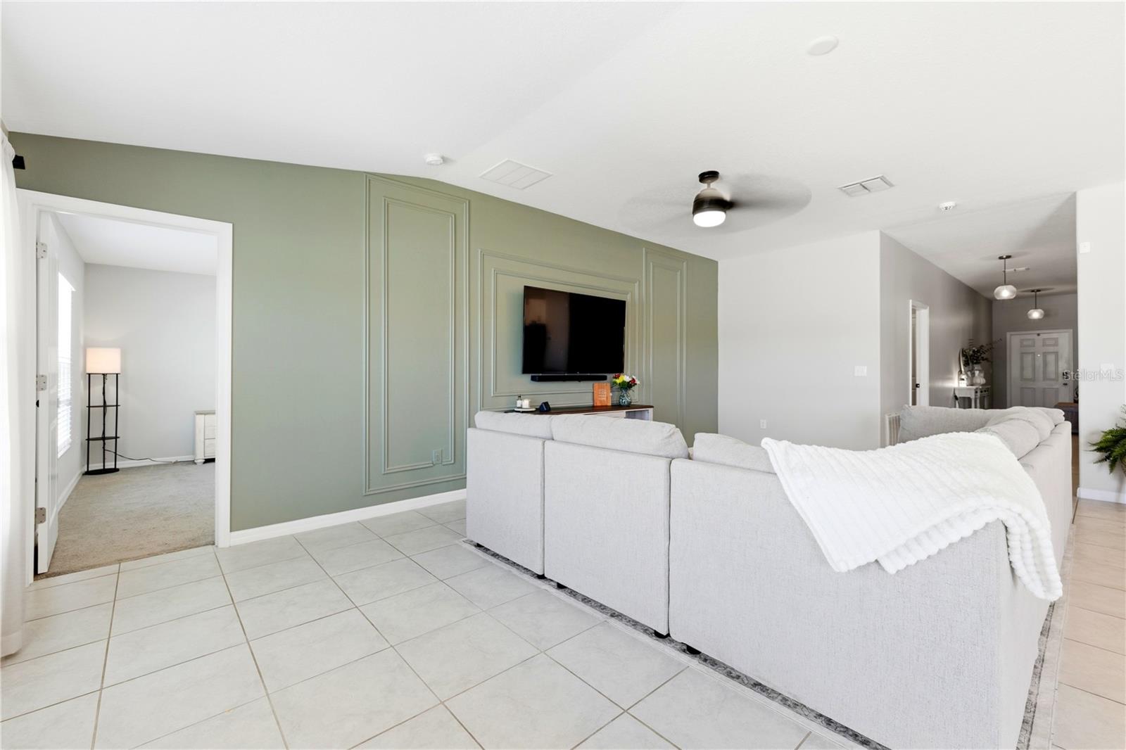 The split floor plan offers privacy, with the primary just off the living room