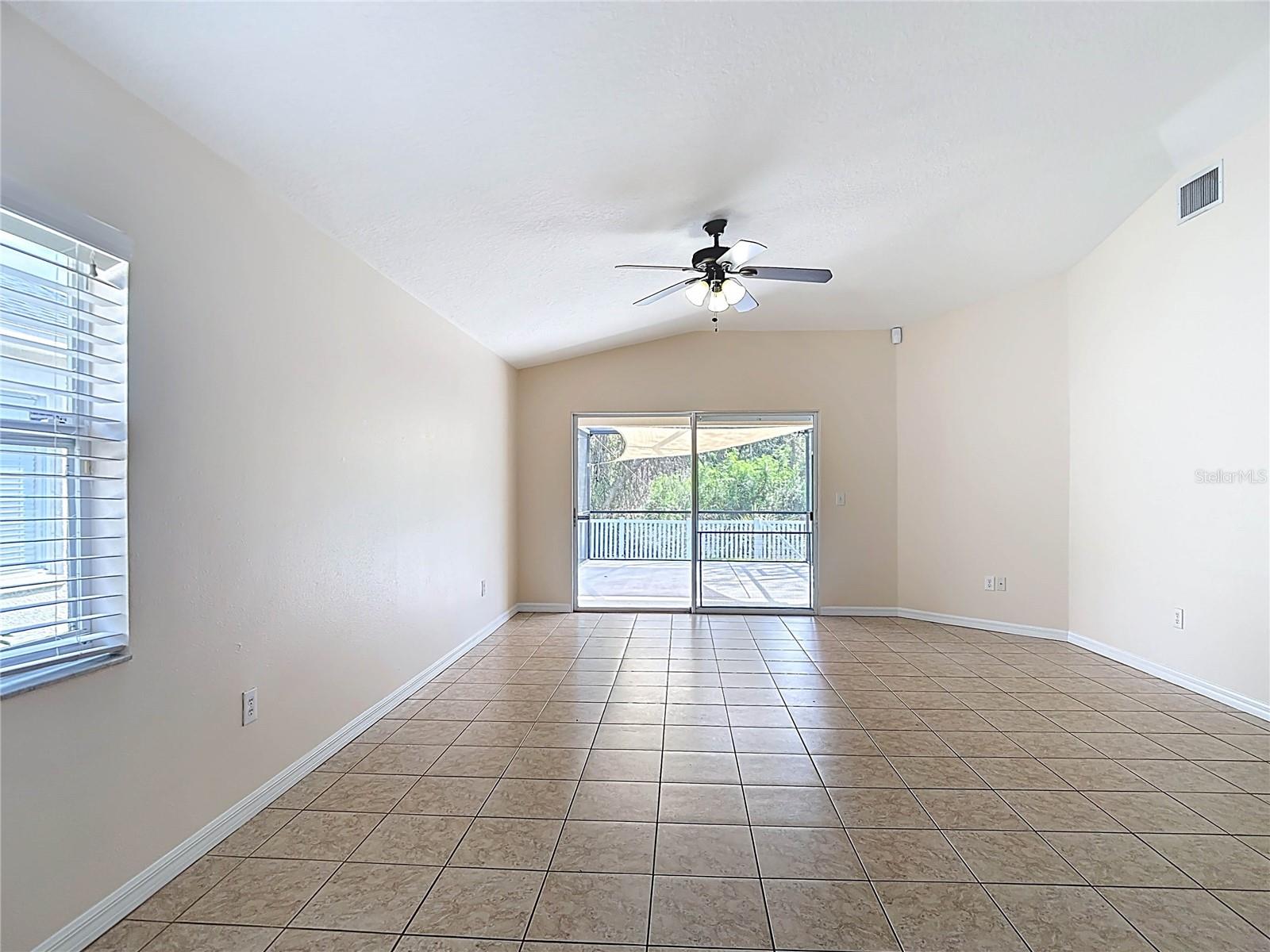 Large great room with sliders to the lanai