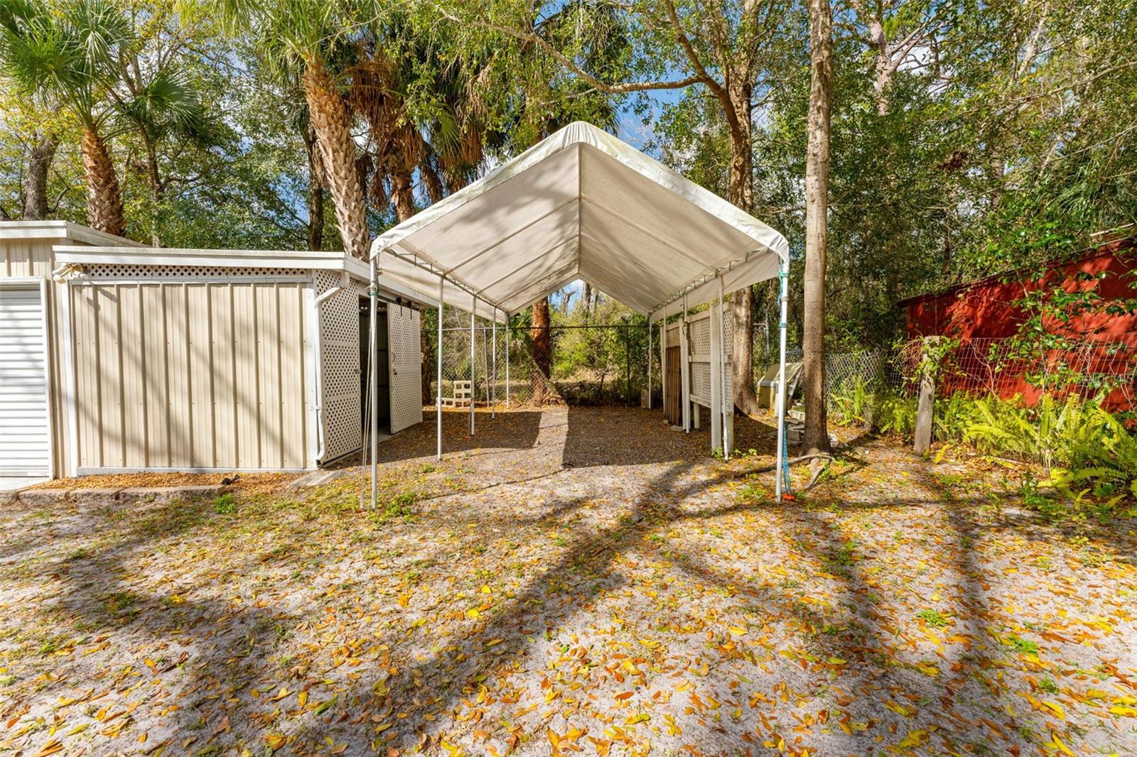 Covered parking for boat or toys.