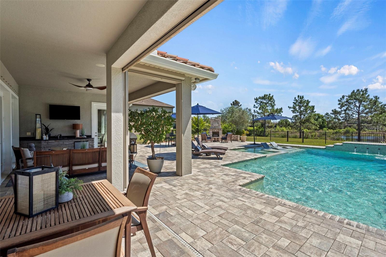 Multiple covered setting areas with remote control retractable screens