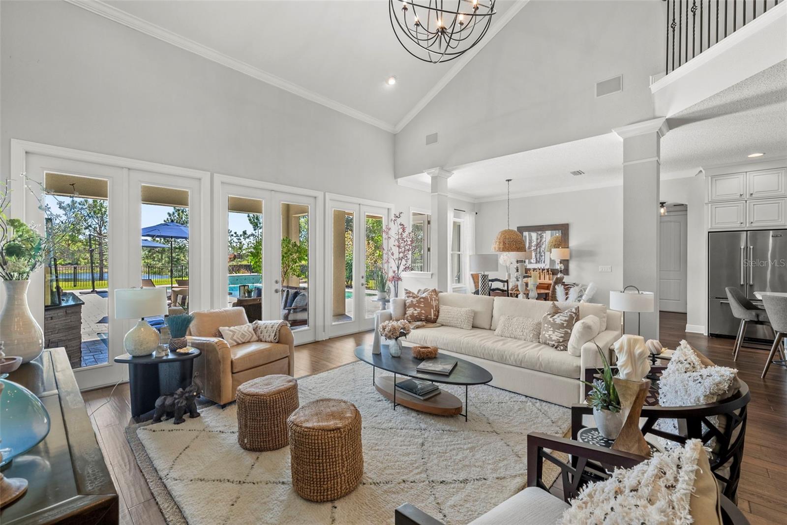 Family Room with 3 sets of French door leading to the outside oasis.