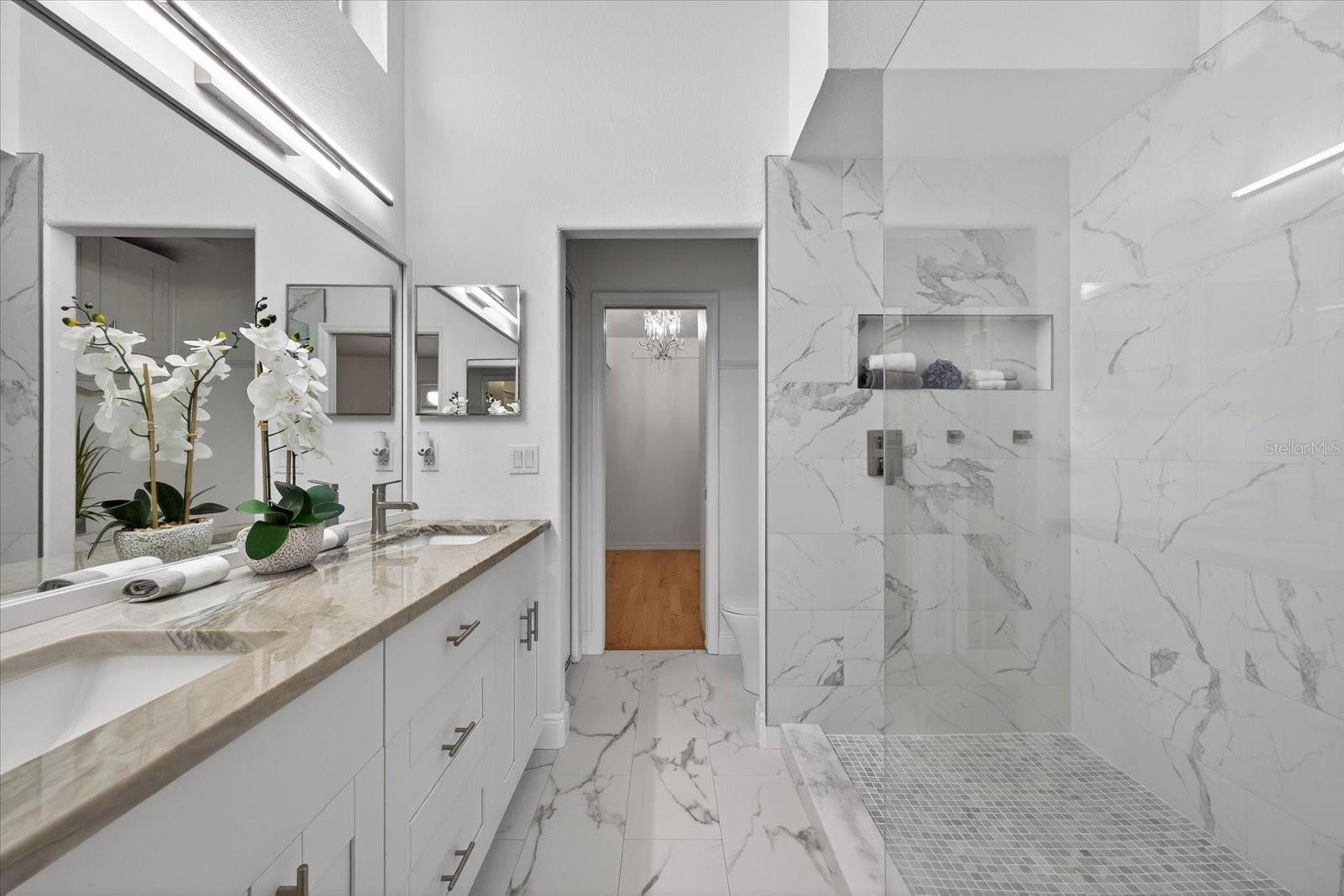 Double vanity and large walk in shower in Primary