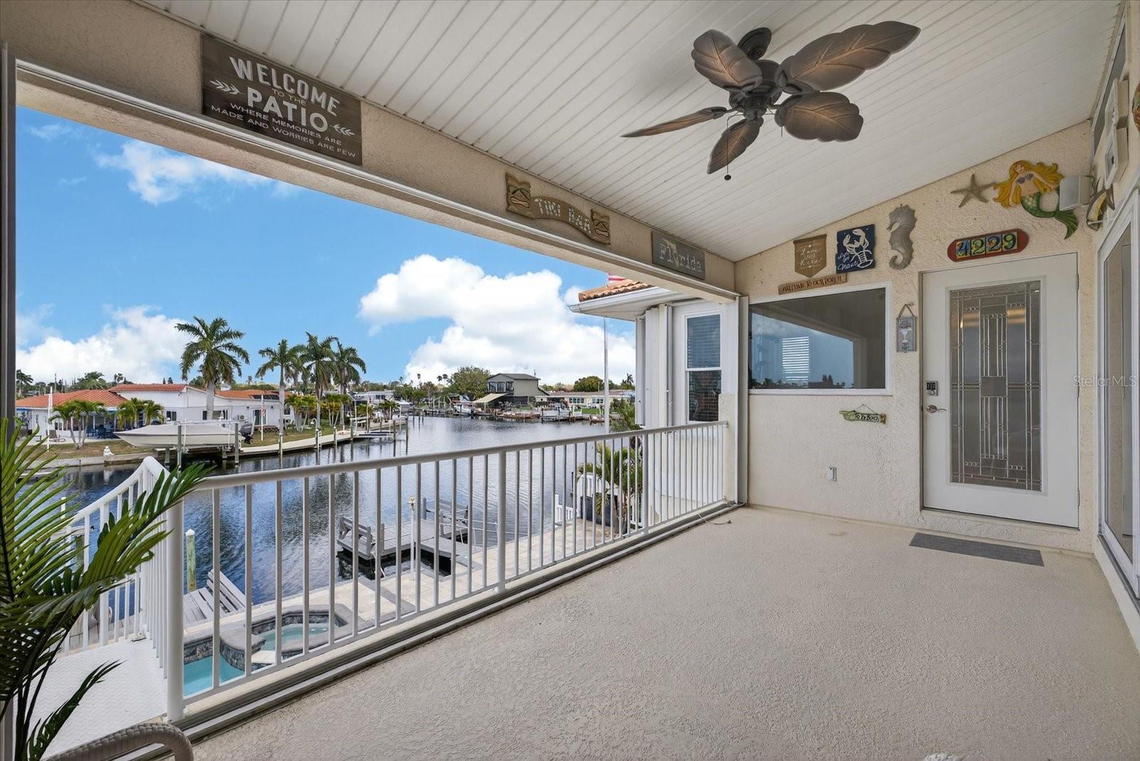 Balcony water views with entry via Great room and Kitchen.